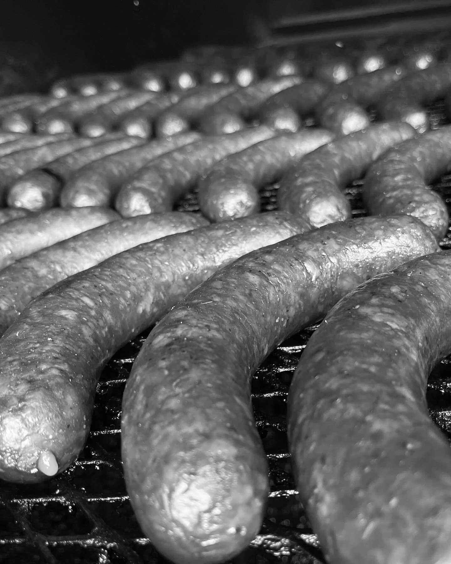Close-up of sausages on a grill.