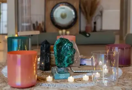 Music instruments, gong, crystal sound bowls and notepad which says luv yourself by natalia.