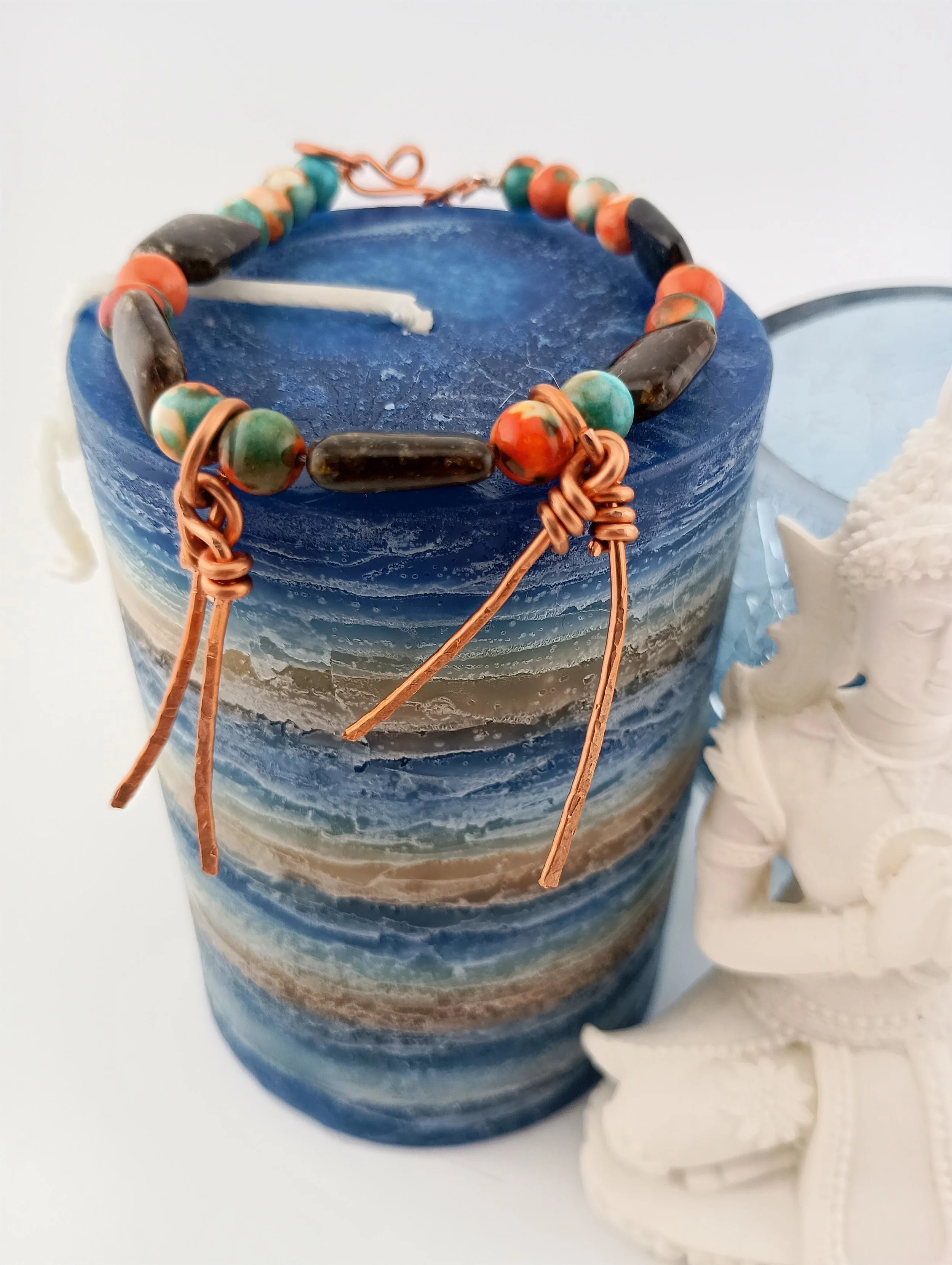 SGBB11 Blue striped candle and white Buddha.JPG