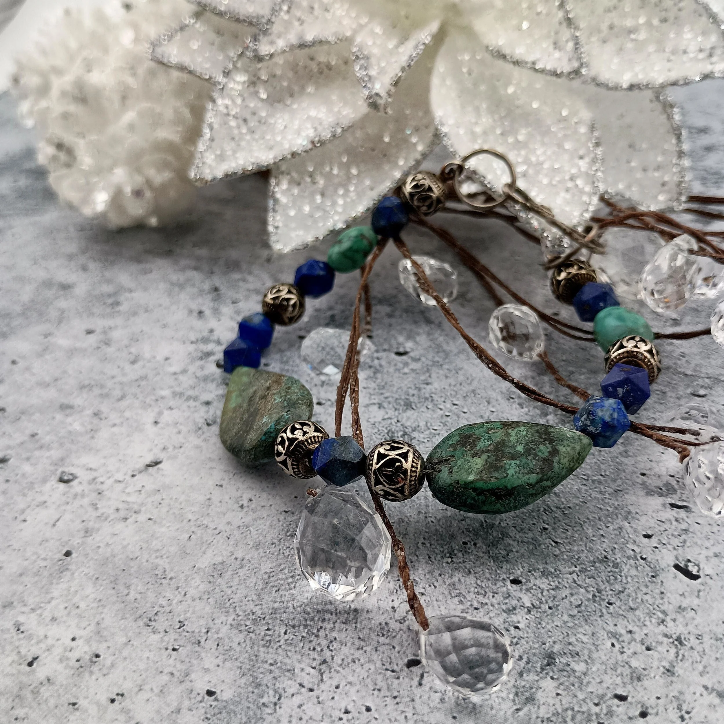 SGBB5 blue background white pinecones poinsettia bit and glass beads.JPG