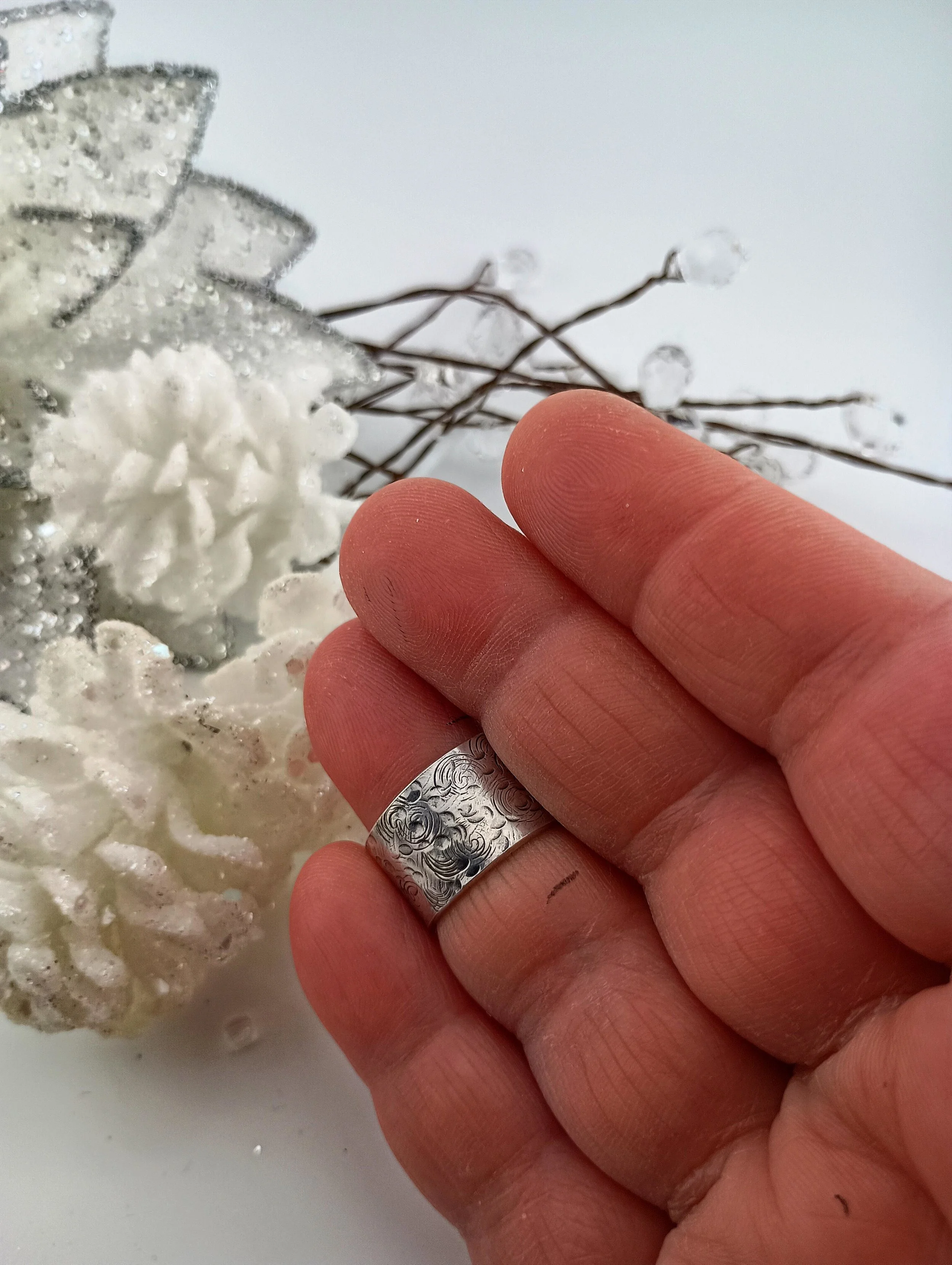 SGSR5Ring White pineconces on finger.JPG