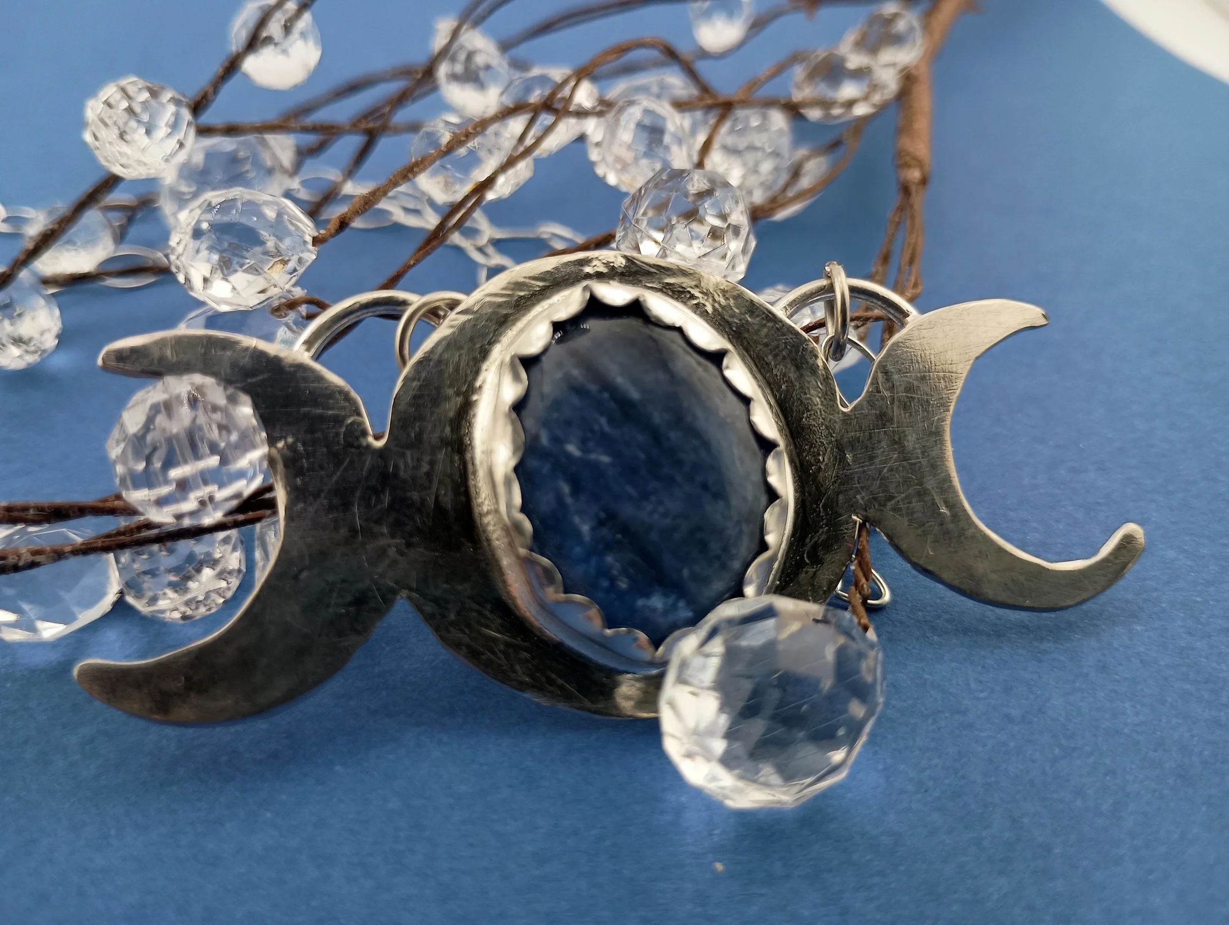 Kyanite TP blue background clear beads.JPG