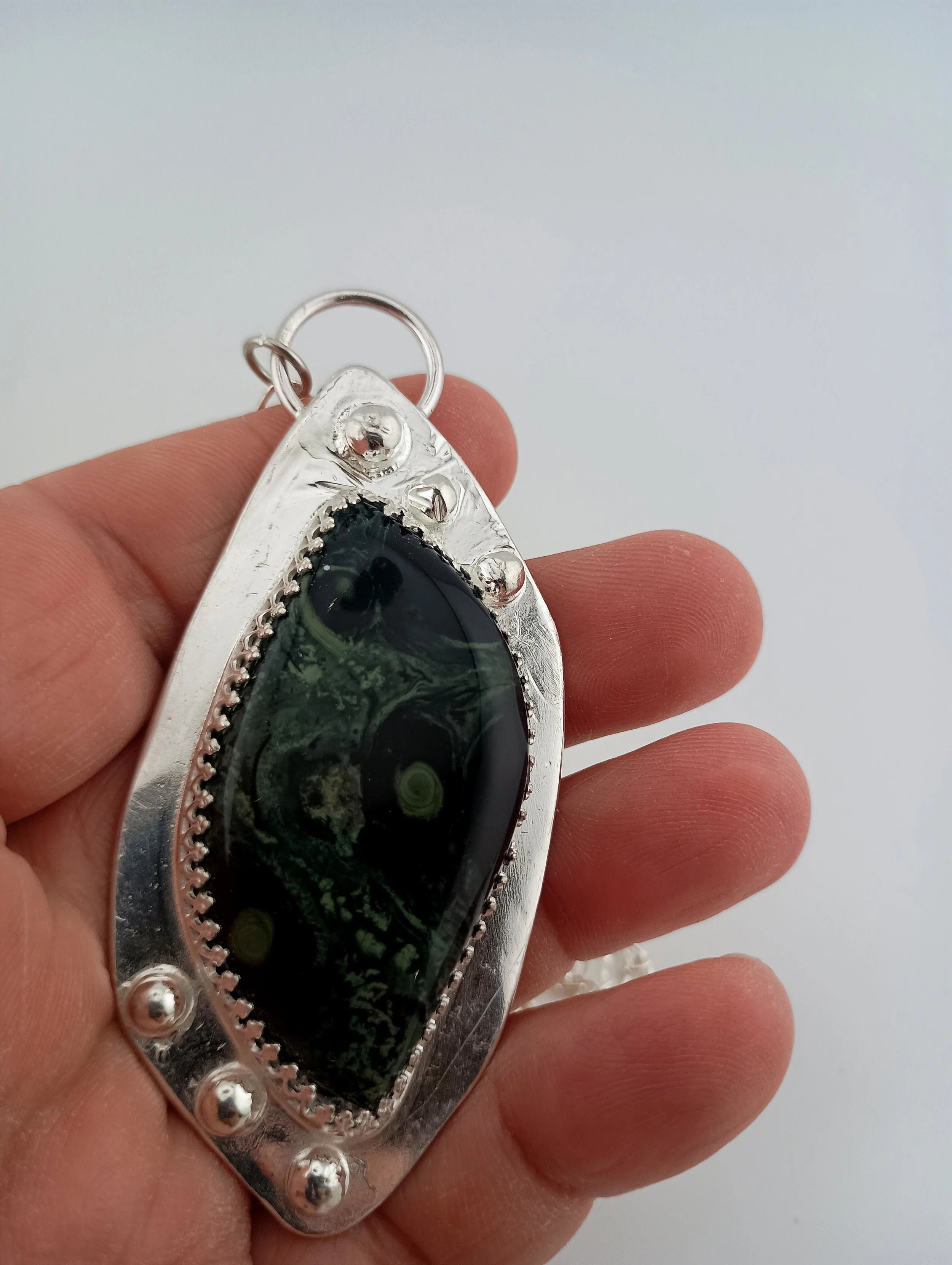 Kambaba jasper in hand.JPG