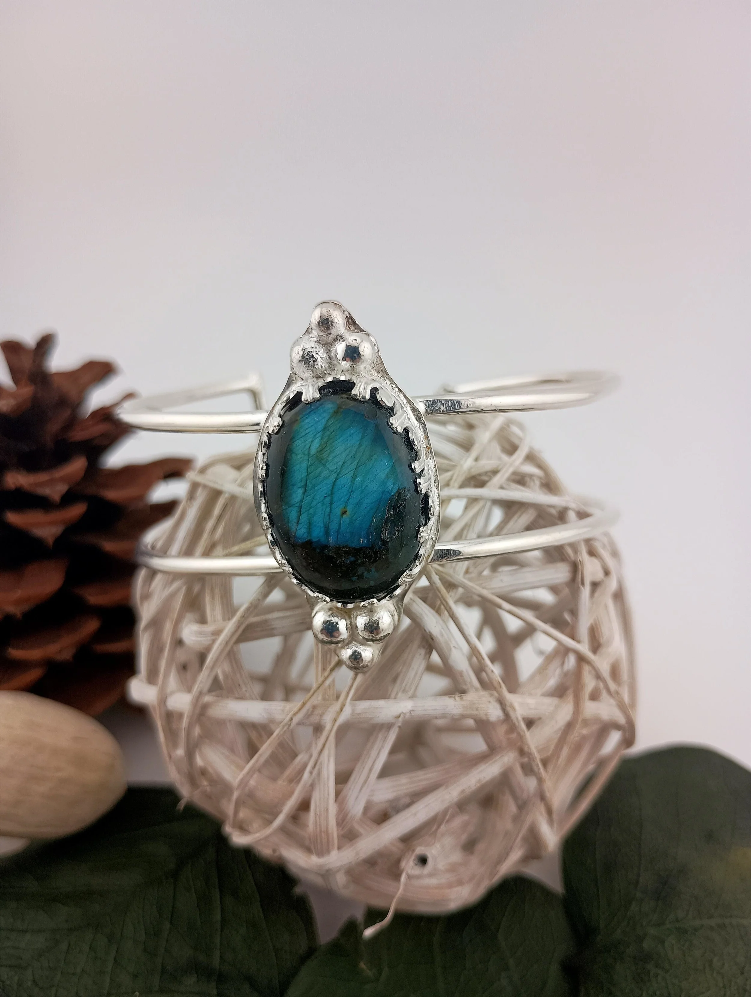 Labradorite Cuff white ball green close up.JPG