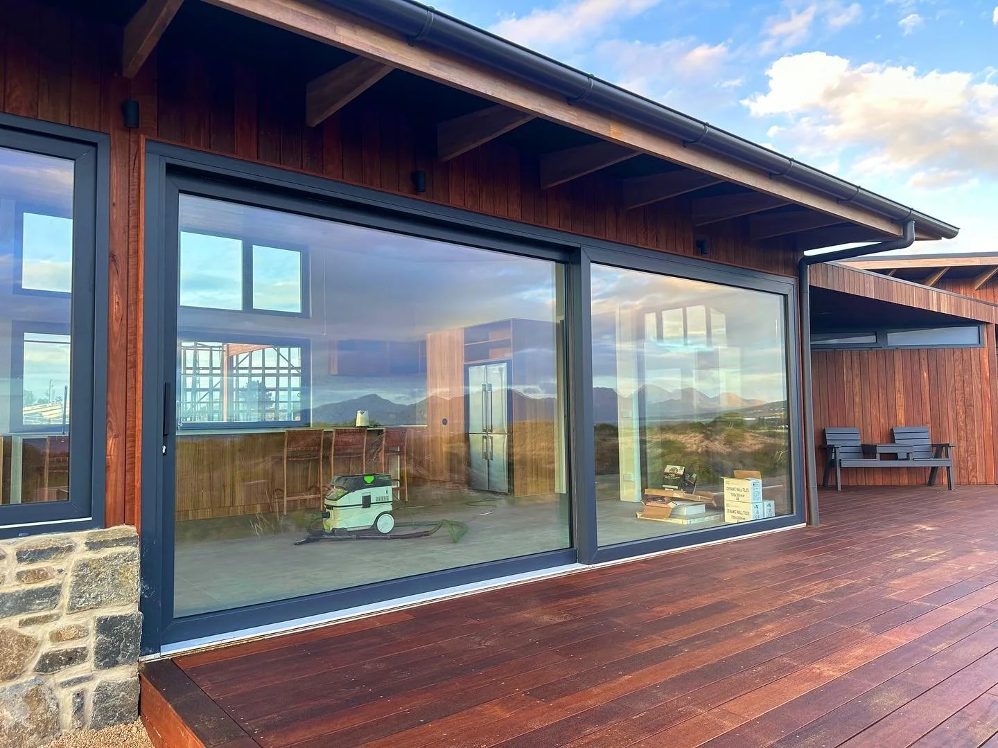 Magnificent Lift & Slide system in Dolphin Sands. Anthracite Grey uPVC frames.