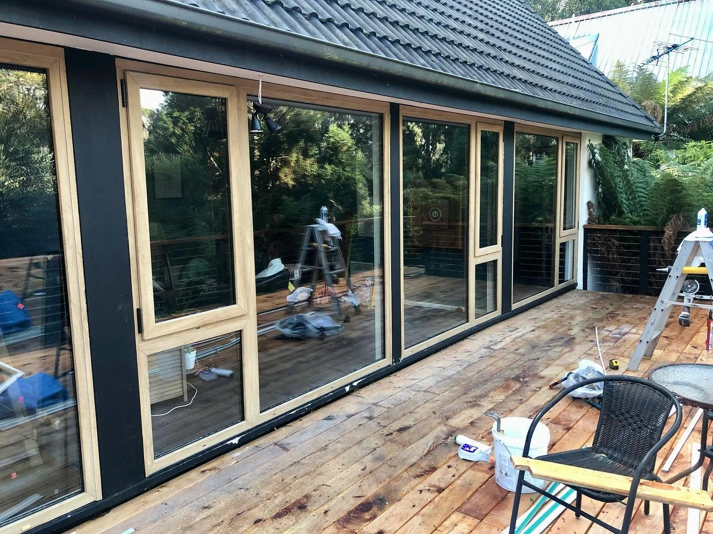 A striking contrast between the Woodec Turner Oak Malt uPVC frame and a dark exterior finish.
