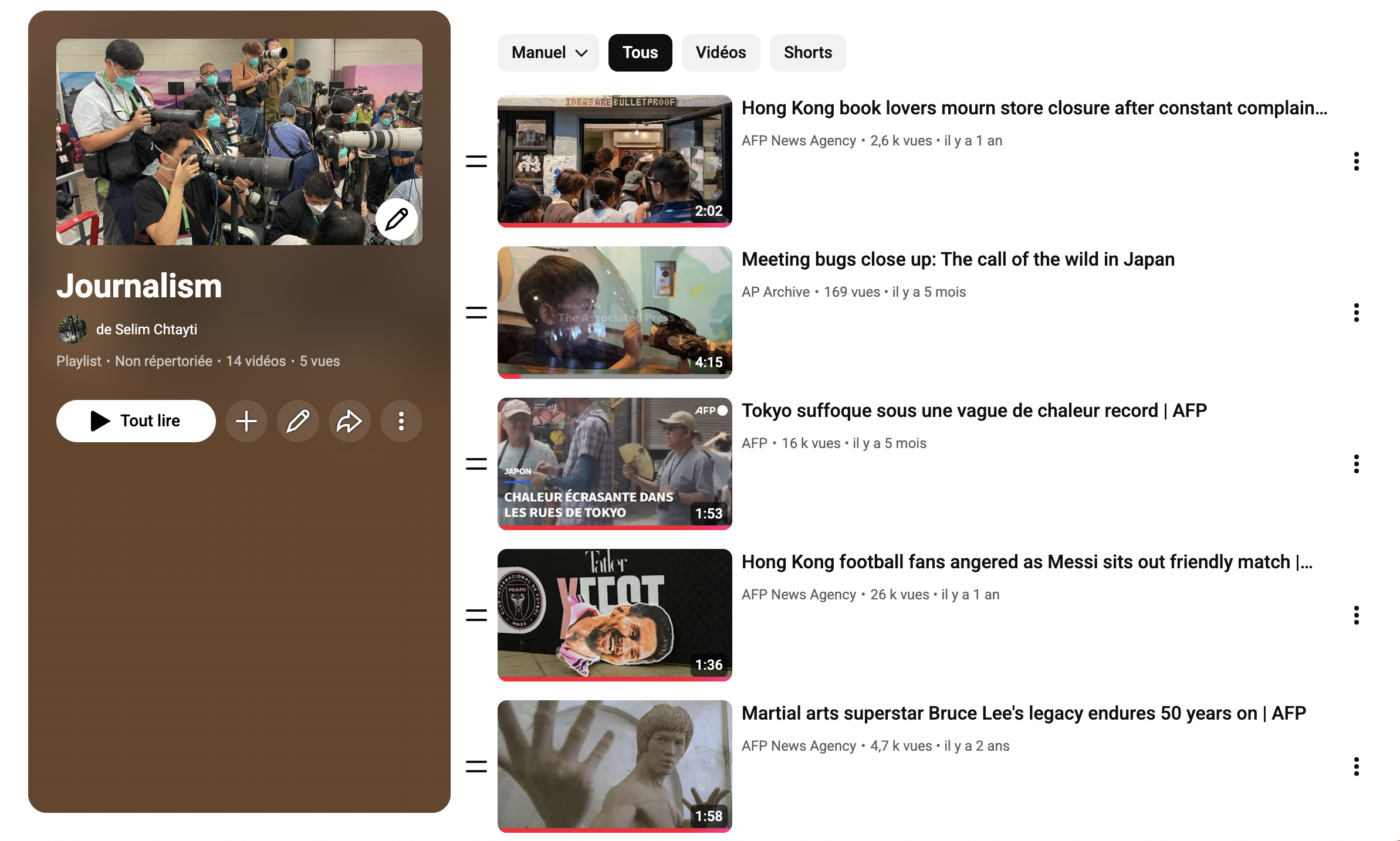 Screenshot of a YouTube playlist titled 'Journalism' by Selim Chatyti, showing a group of photographers at a press event holding cameras with large telephoto lenses, many wearing face masks. The playlist contains 14 videos with 5 views.