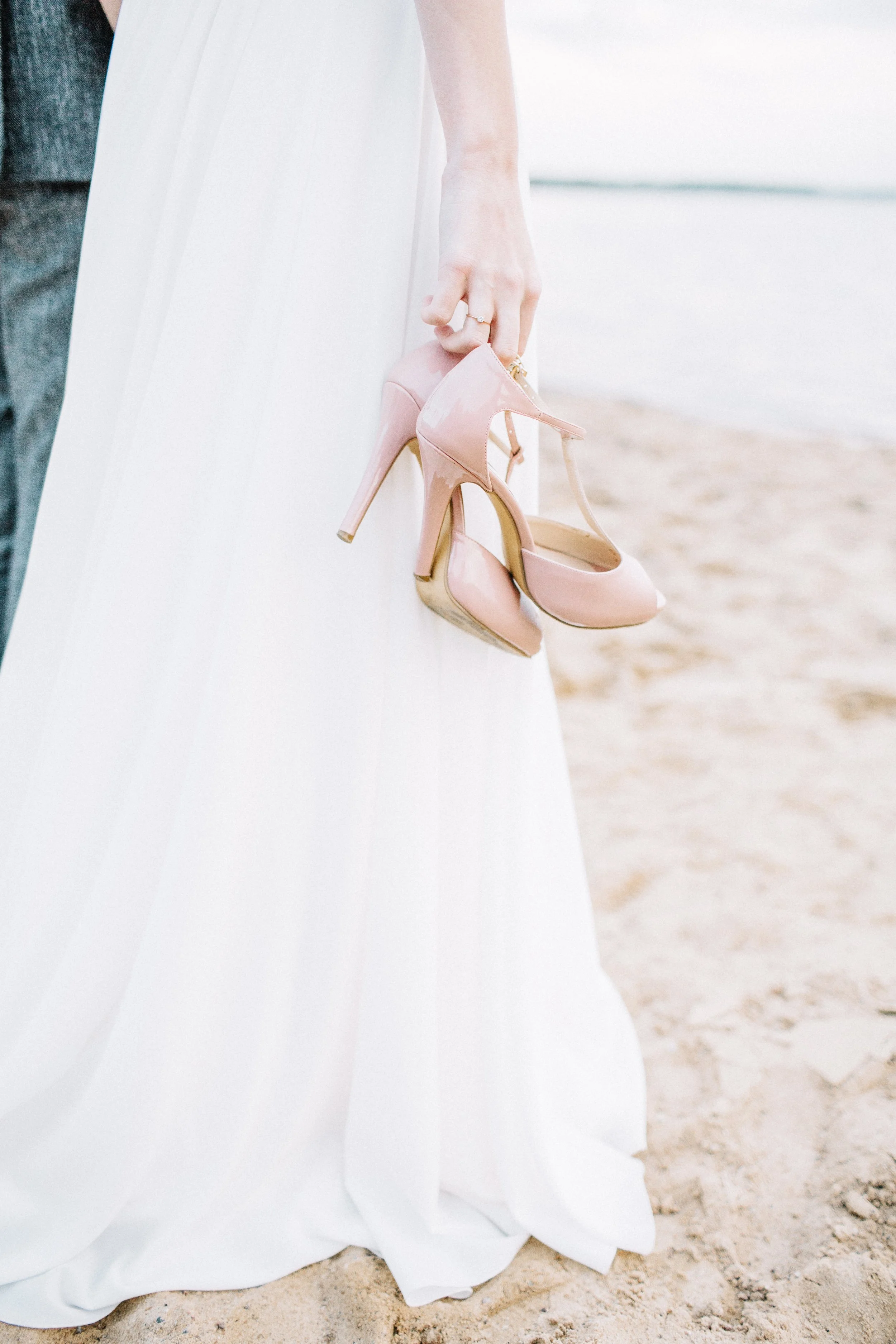 Canva - Woman Holding Heels in Hands .jpg
