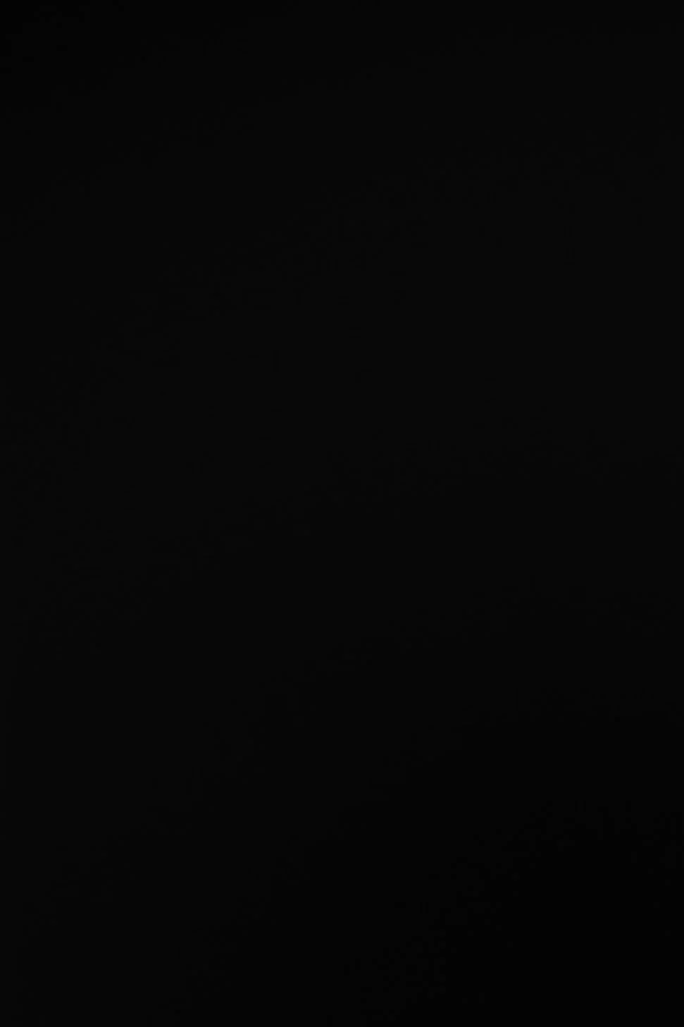 A mostly black image with no distinguishable objects or details.