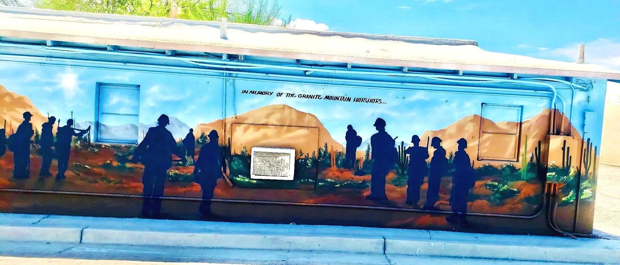 Hand-painted custom public mural by Jade Bamford Murals in Wickenburg, Arizona.