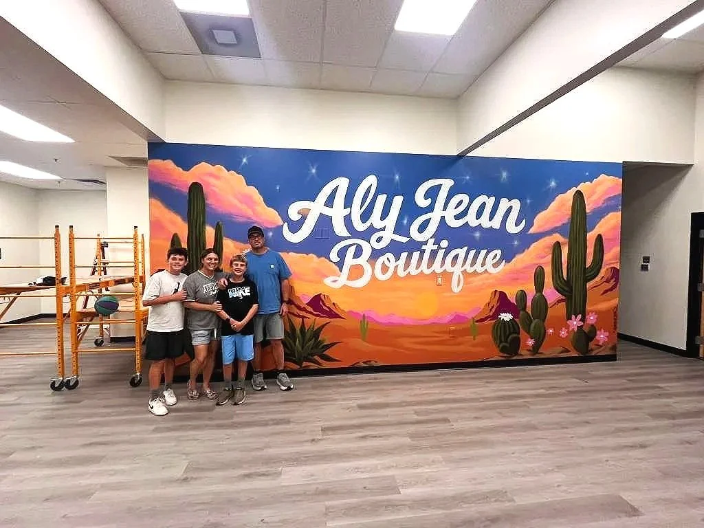 Custom hand-painted commercial wall mural for Aly Jean Boutique by Jade Bamford Murals in Mesa, Arizona.