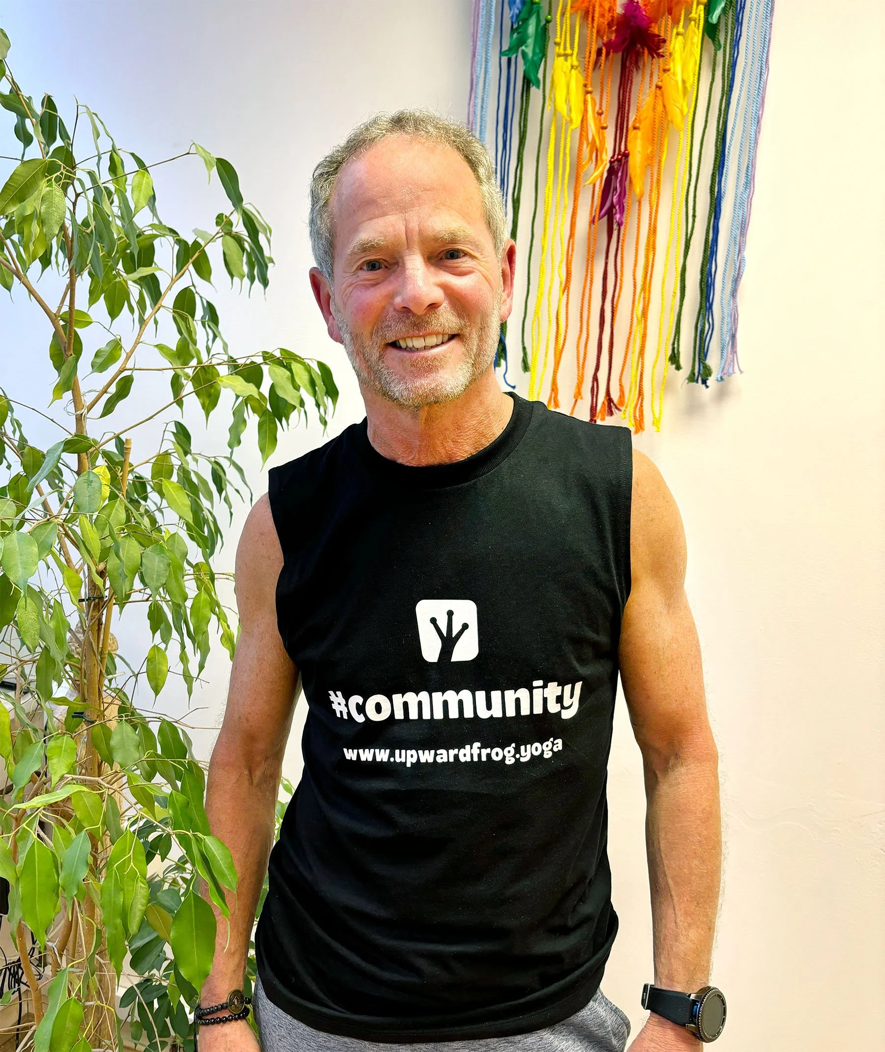 Upward Frog student wearing a black Upward Frog #community sleeveless top.