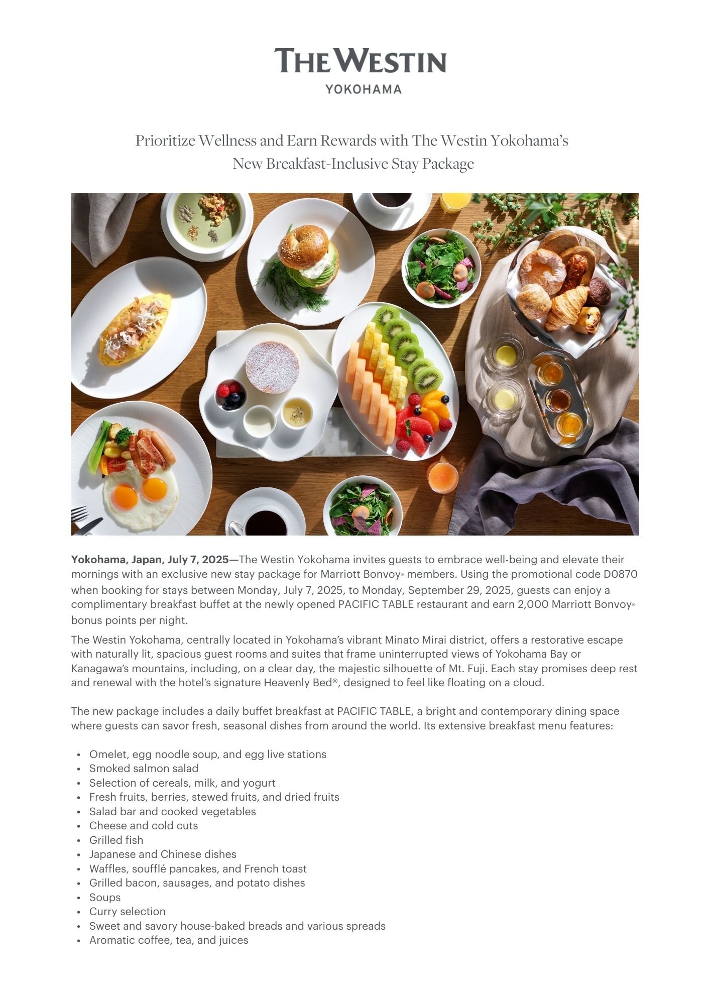 A breakfast buffet with assorted fruits, eggs, baked goods, salad, and beverages, arranged on a wooden table.