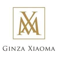 Ginza Xiaoma logo in gold with black text