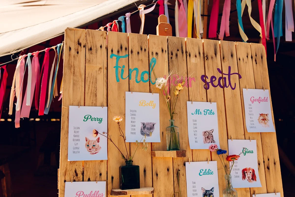 A fun wooden table plan outside the tipi at chalkney water meadow