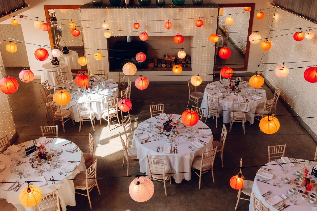 Alternative wedding reception styling with colourful décor at Houchins Wedding Venue