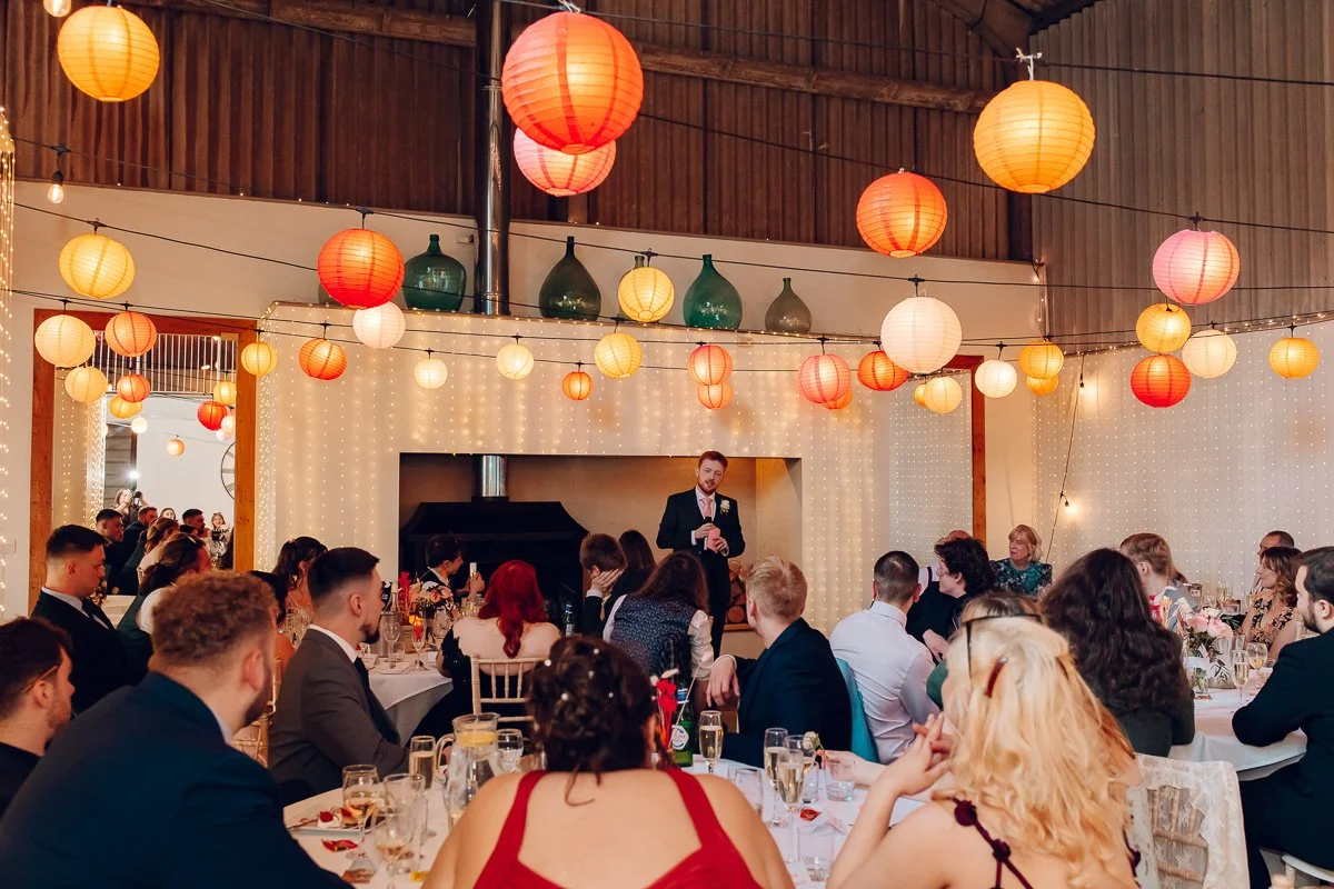 A Documentary image of the speeches at houchins wedding venue