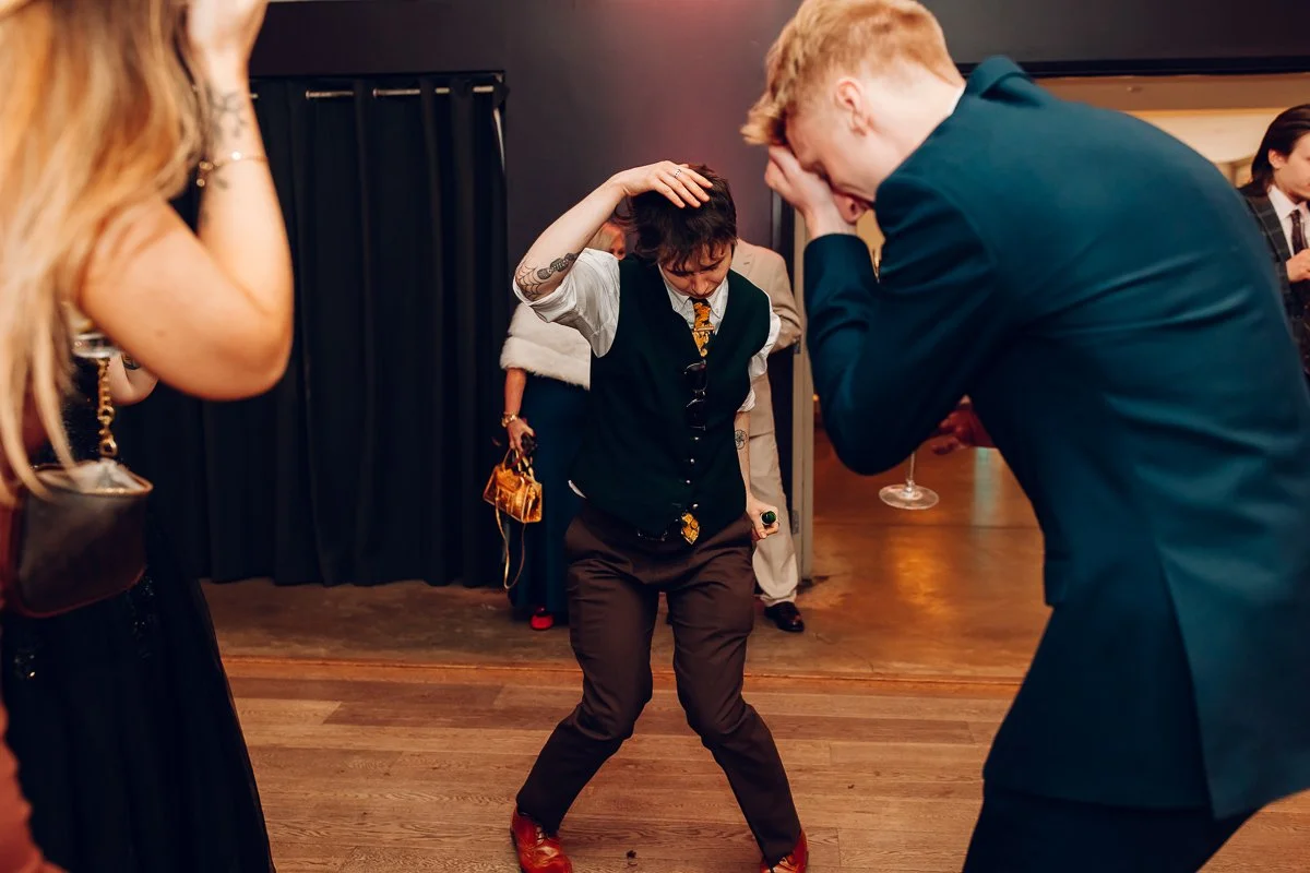 A Candid photograph of a guest dancing