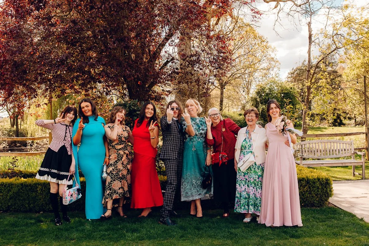 A Fun and relaxed group photo at houchins wedding venue