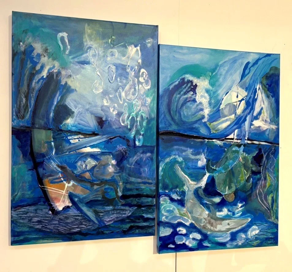 Abstract blue and teal paintings featuring swirling forms and waves, arranged as a diptych on a yellow wall.
