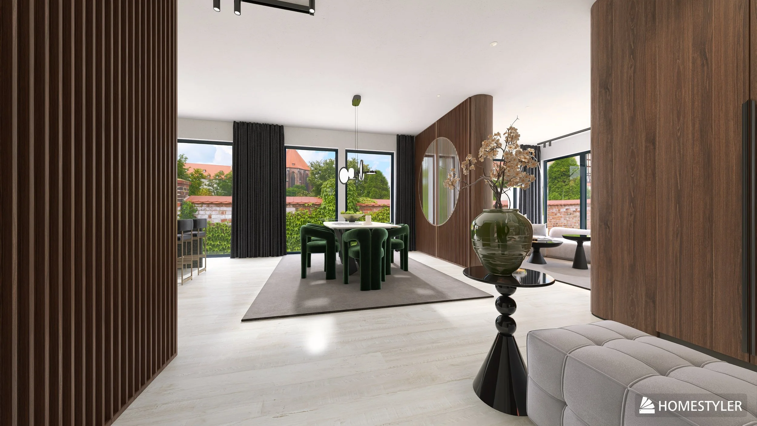 Modernes Wohnzimmer mit gro dfer Fenstern, Holzwanddekor, grauem Teppich und gr fcnen Sessel um einen weißen Tisch; Vase mit Blumen auf schwarzem Beistelltisch, bequeme Sitzecke im Hintergrund