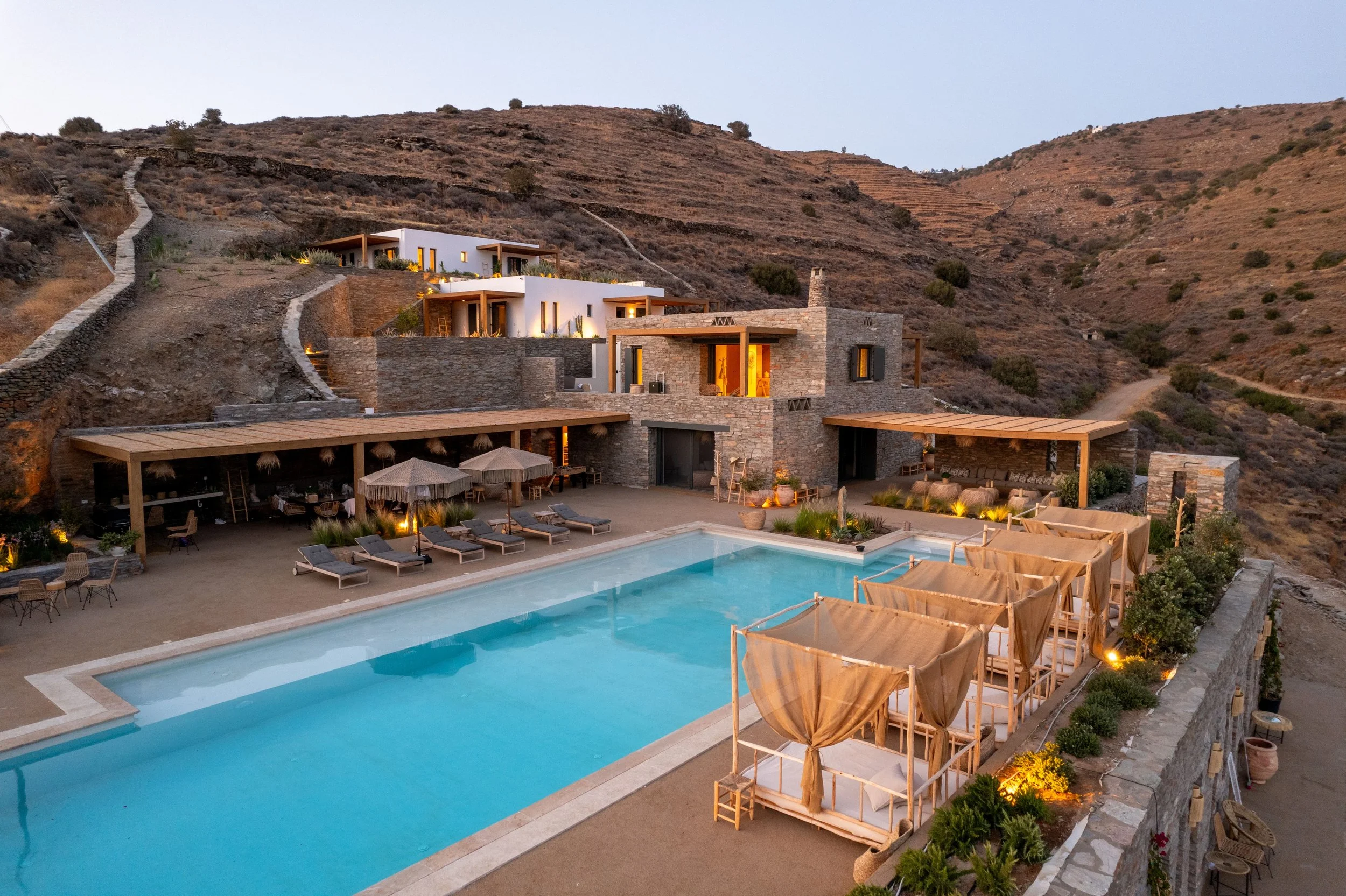 Villa Naos with outside pool and deckchairs