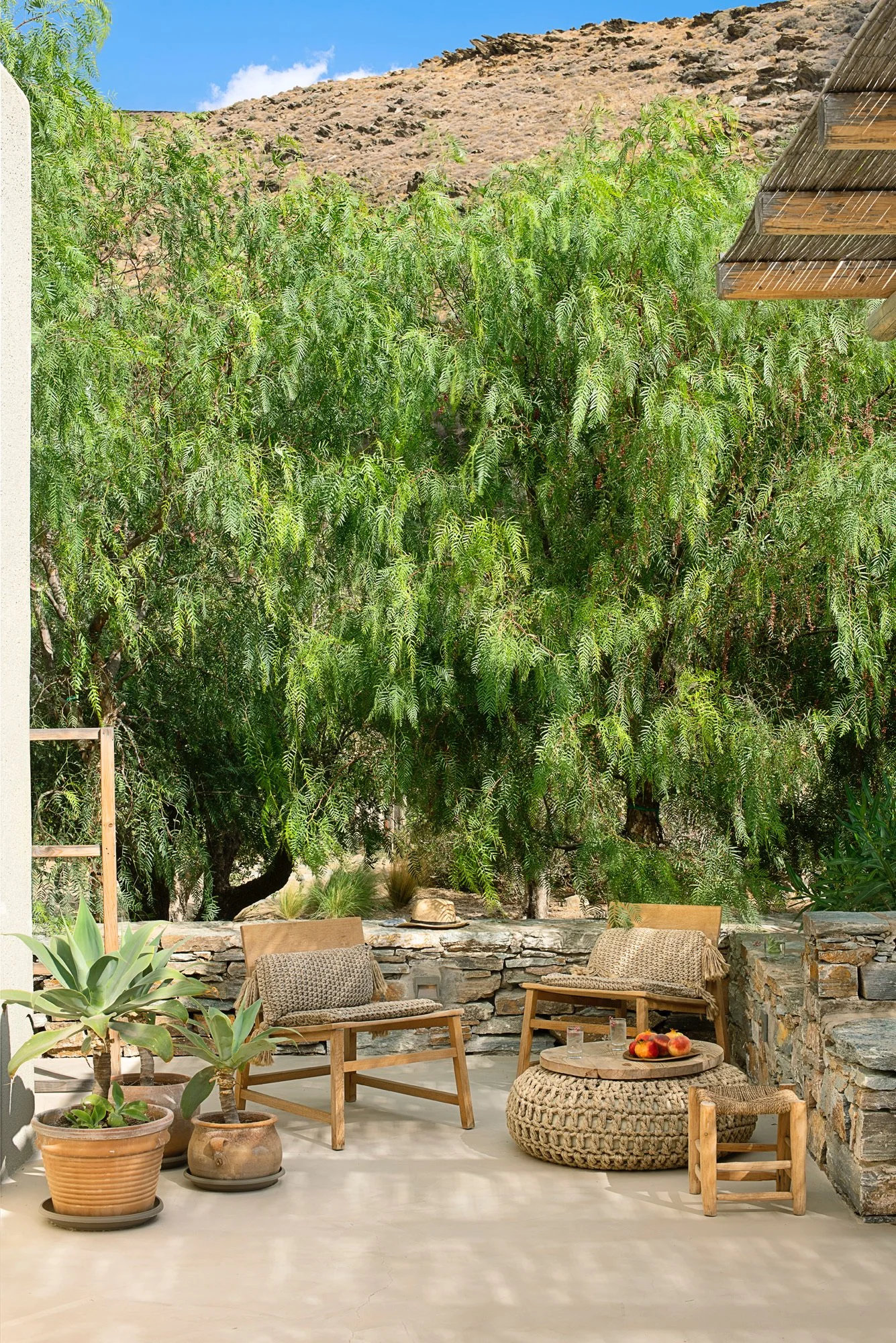 Outdoor wooden seating by a serene setting