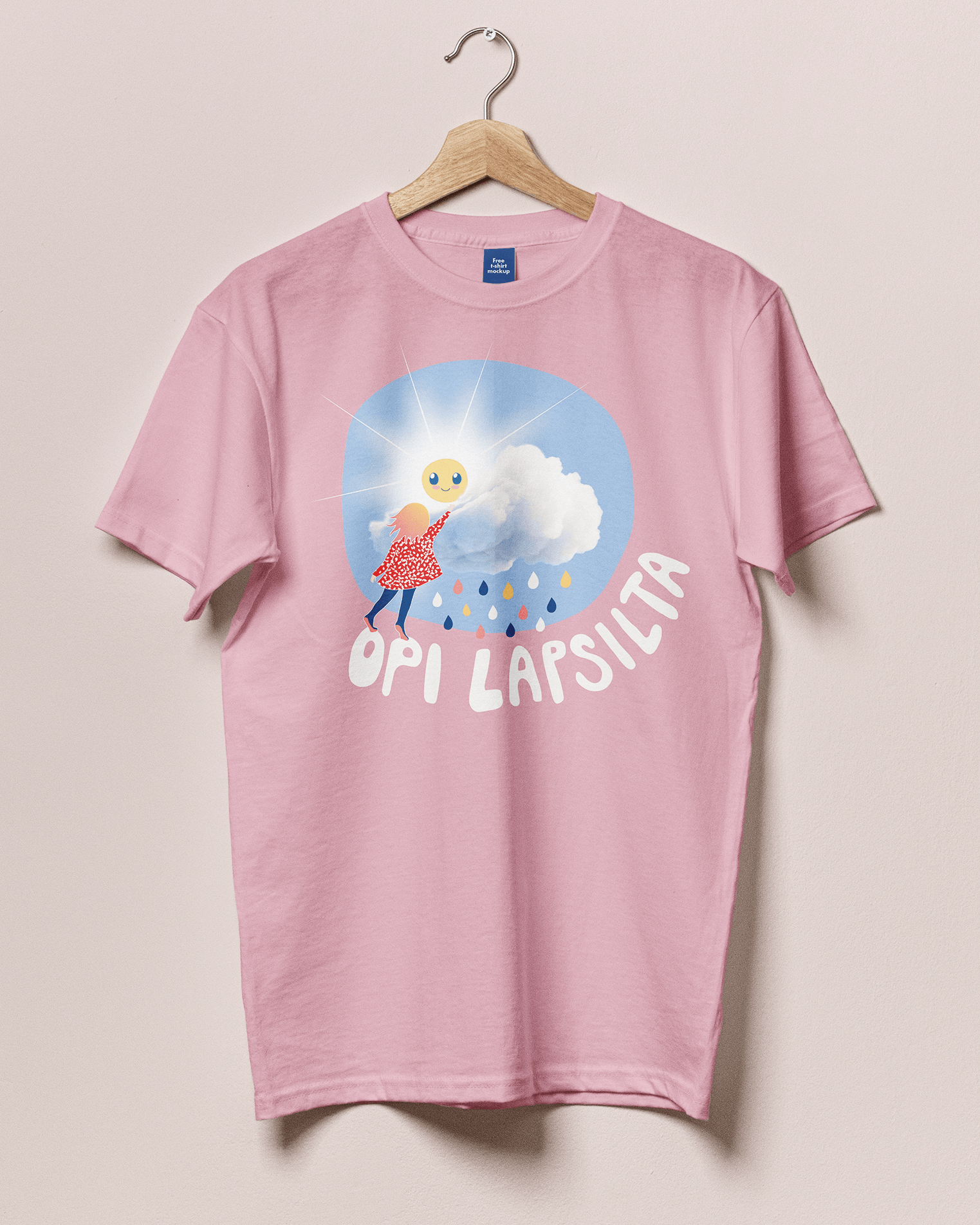 Pink T-shirt with a cartoon graphic of a girl with pink hair and a red dress, standing next to a cloud with raindrops and a shining sun with a smiling face, and the text "OPI LAPSISTA" below it.