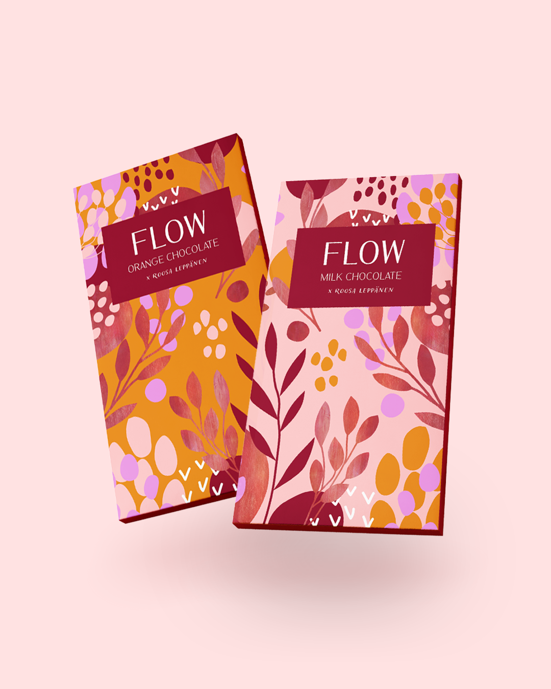 Two colorful chocolate bar packaging designs, one orange-flavored and one milk-flavored, with floral and leaf patterns on a light pink background.