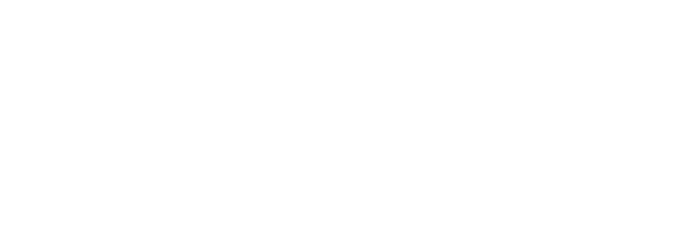 A black and white close-up photograph of a dog's face, focusing on its nose and eyes.