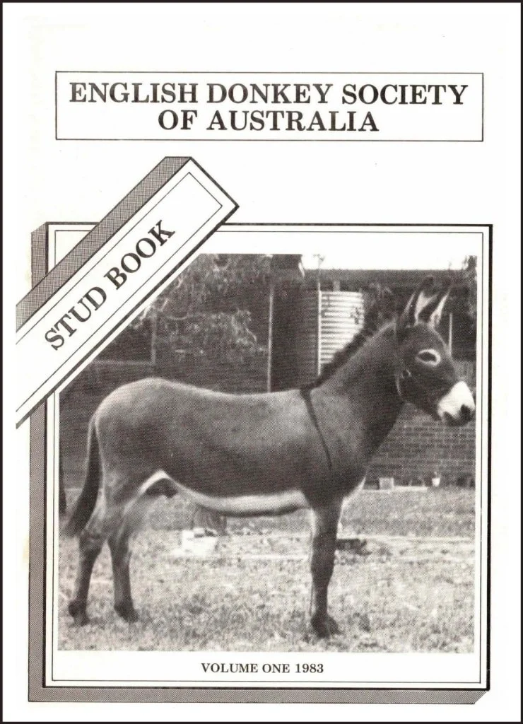 Cover of a booklet titled 'English Donkey Society of Australia Stud Book Volume One 1983', featuring a black-and-white photograph of a donkey in a farm-like setting.