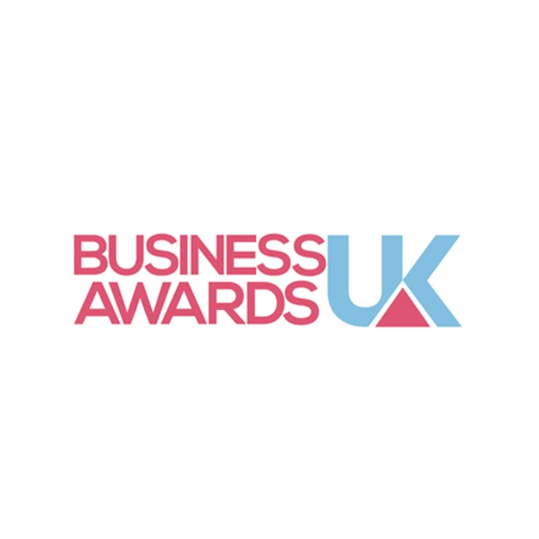Logo for Business Awards UK in pink and blue text.