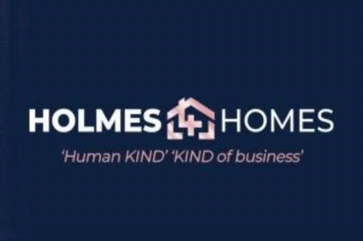 Holmes Homes logo with a house icon and the tagline 'Human KIND' KIND of business.