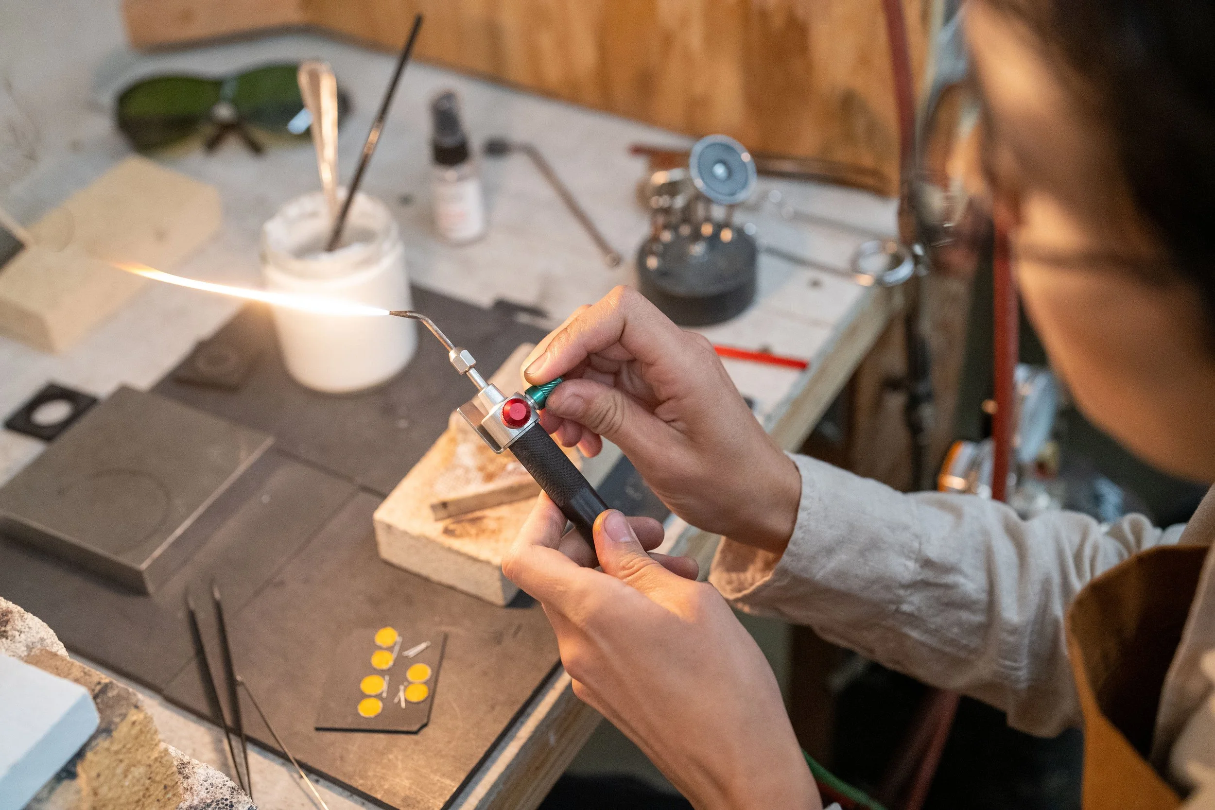 turning on torch earrings copy.jpg