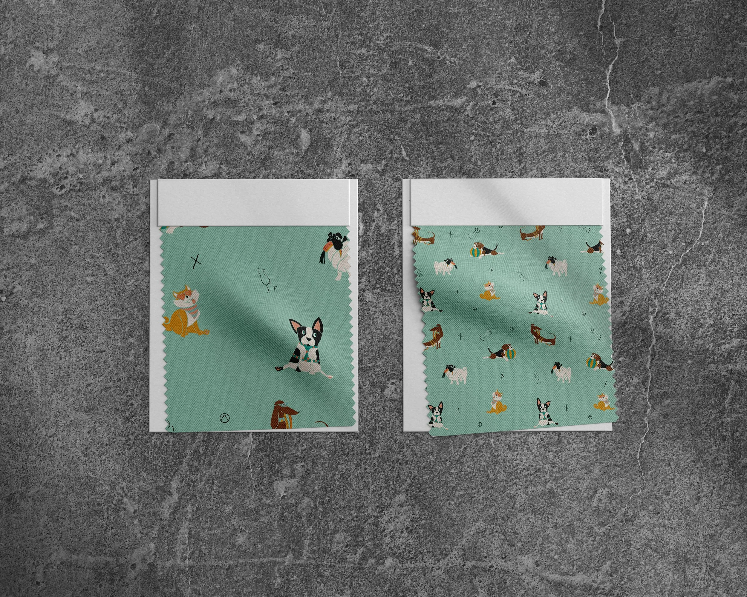 Two fabric swatches featuring dog-themed patterns. The left swatch has illustrations of dogs, bones, and a bird on a light teal background. The right swatch displays a repeating pattern of various dog illustrations on the same light teal background.