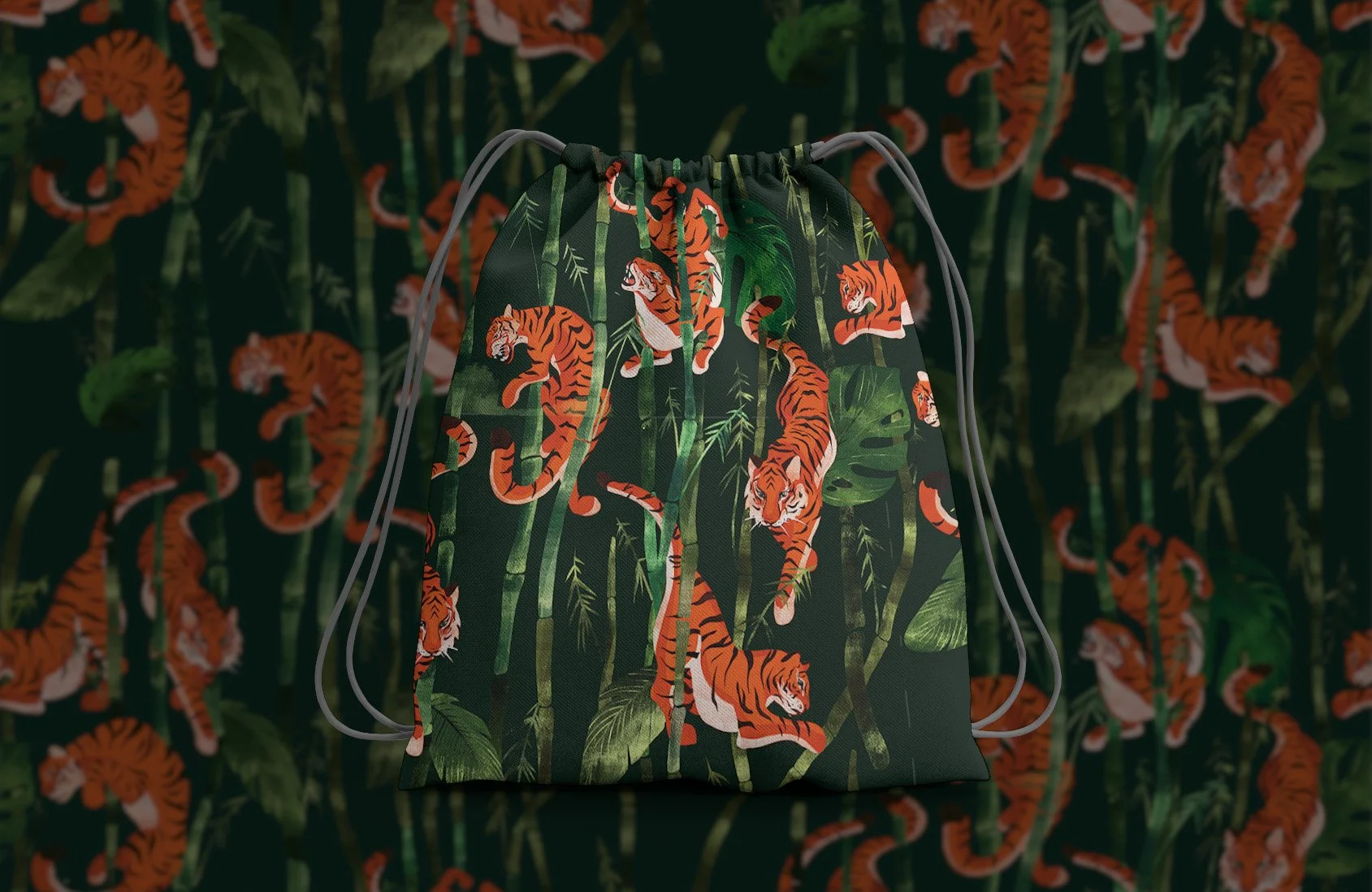 A drawstring backpack with a tiger and jungle foliage pattern, set against a matching background of tiger and jungle designs.