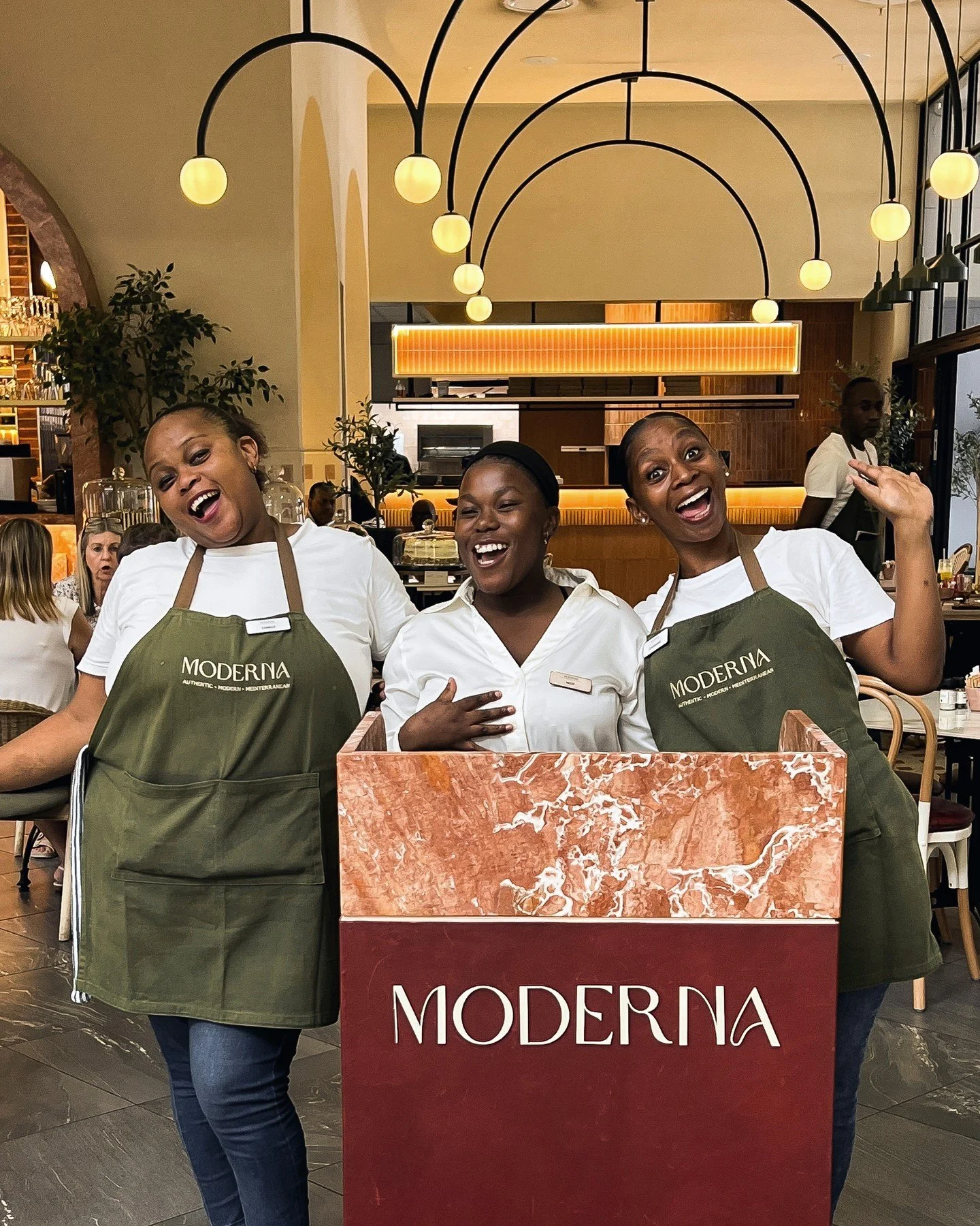 The first smile you see when you arrive, and the reason you&rsquo;ll want to stay. At Moderna, it&rsquo;s always about the people.

Find our menu on our  website (link in bio).

@gatewayumhlanga

#ModernaFamily #HospitalityMatters #FeelAtHome