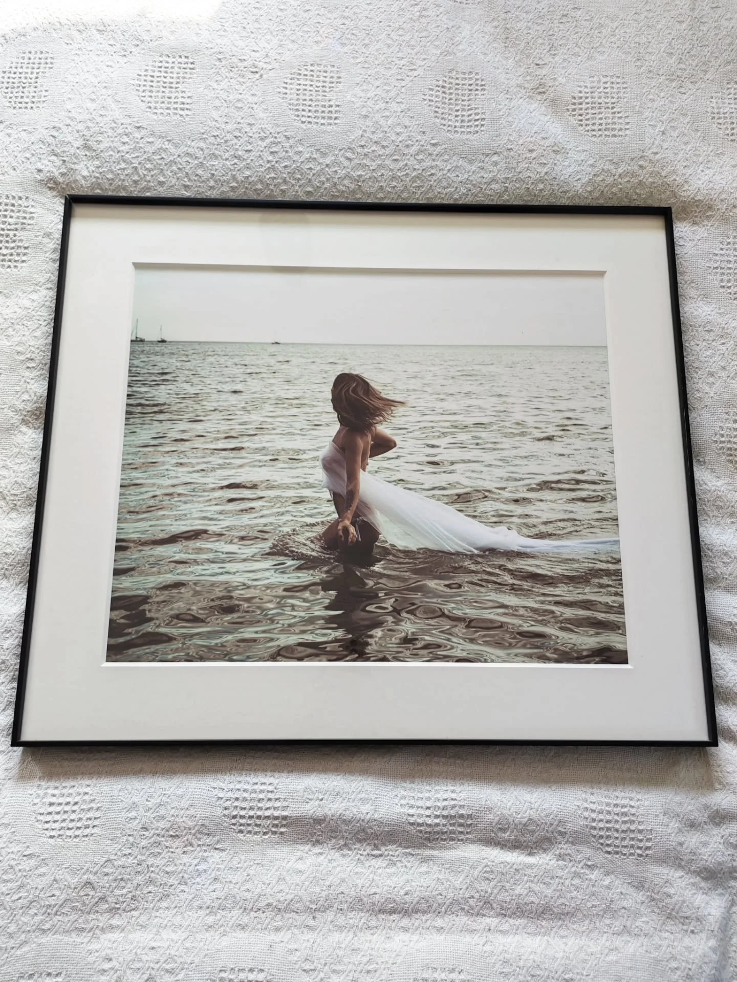 A mystery package was delivered wrapped in black and cardboard and bubble wrap. 

I wondered if it might be some printed copies of my book, but it wasn't heavy enough for that. 

I began cutting through the outer layer when I stopped to look at the s