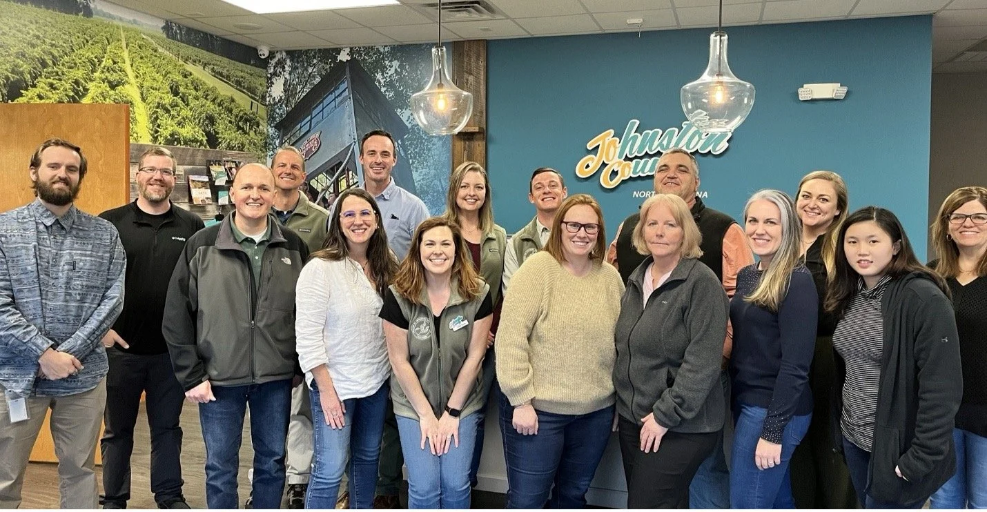 Full board of the Friends organization circa 2024 posing in a group