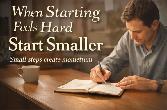 A man beginning a simple task at a desk, representing small-step progress and momentum.