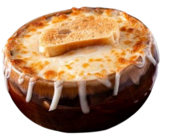 Bowl of cheese dip topped with a toasted bread piece and white drizzle, with a yellow background.