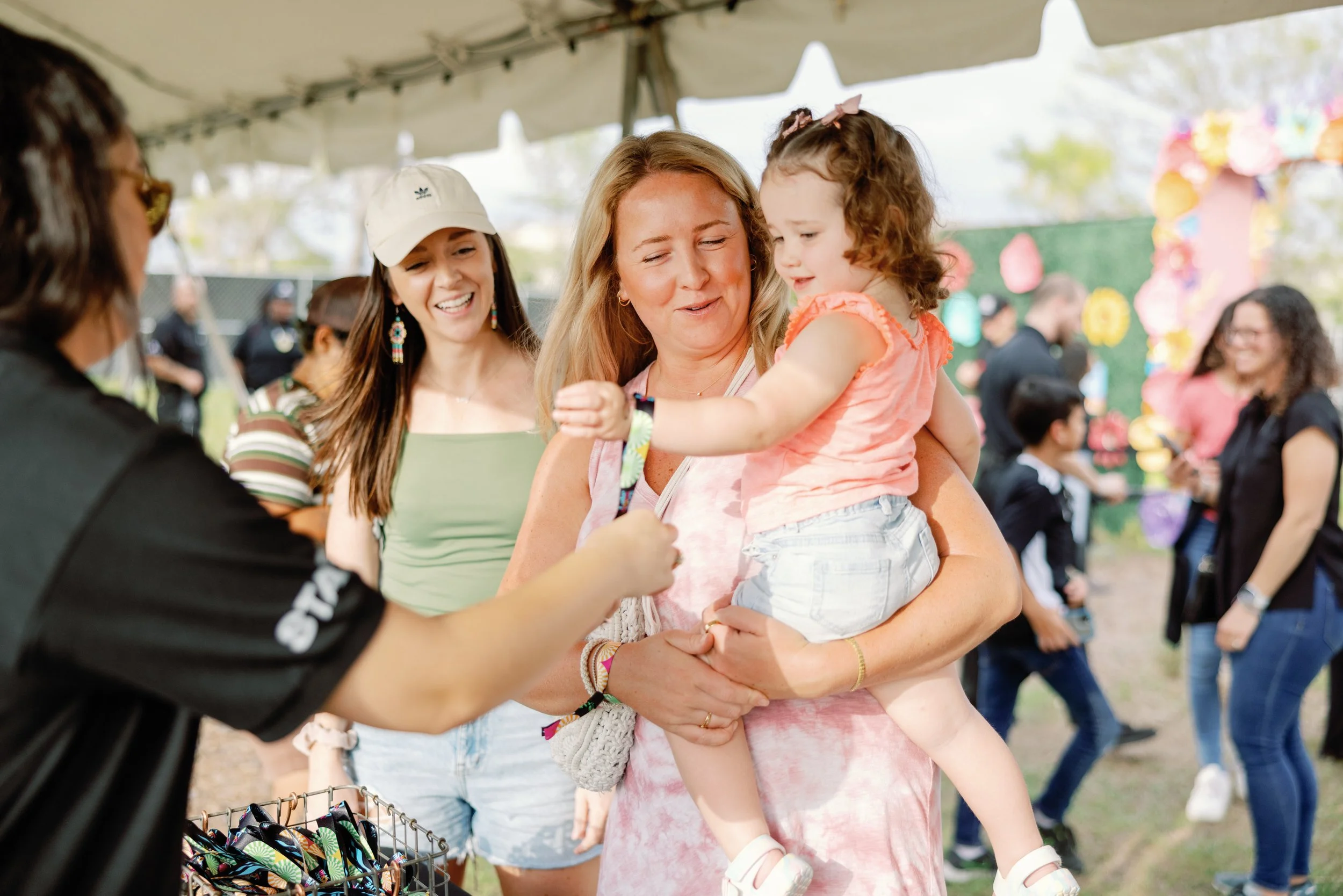 Family entering Lake Nona Live and getting a wristband