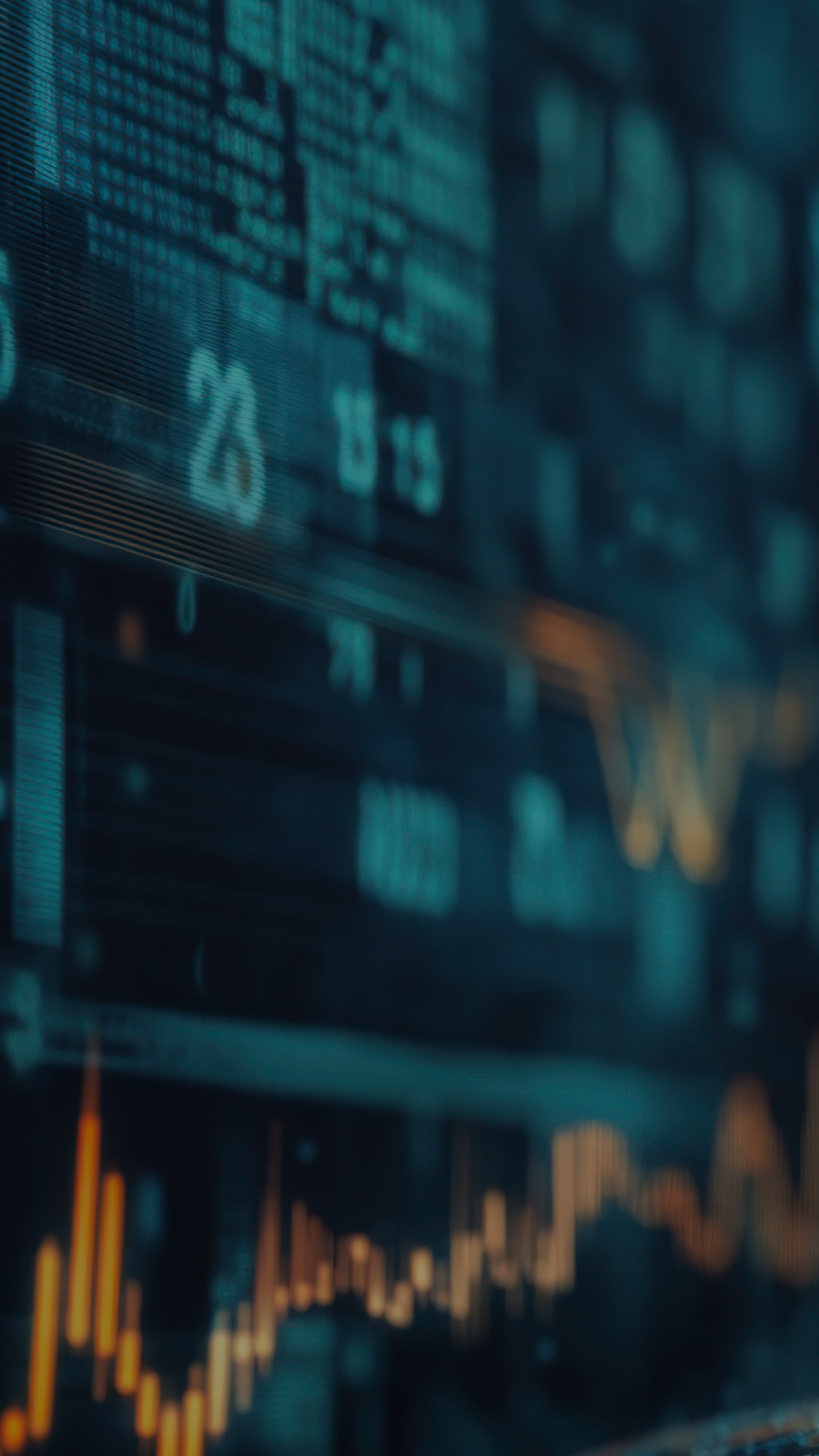 Close-up of a digital stock market display showing various graphs and stock prices in a dark setting.