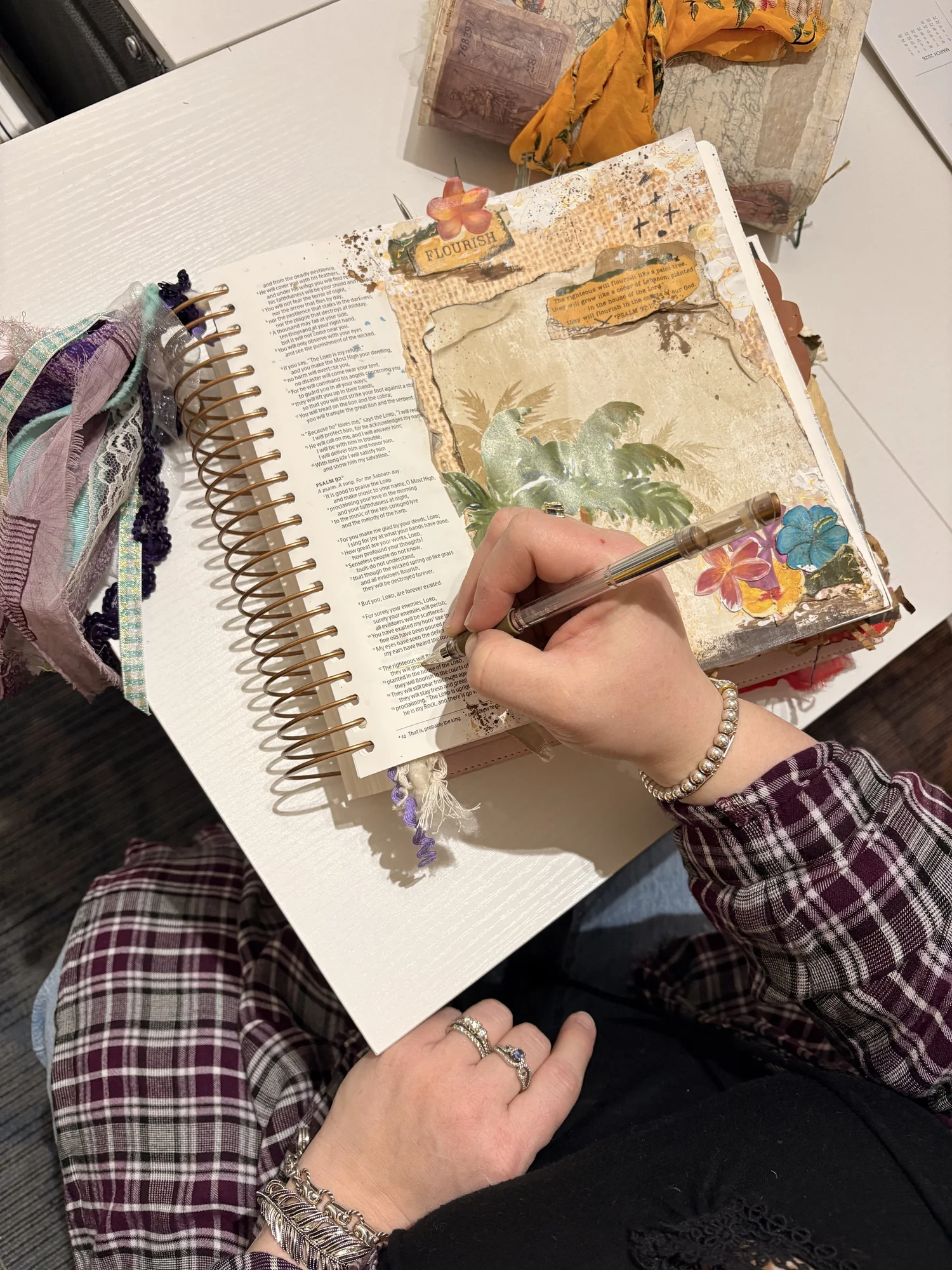 Nicky creating a layered page in her art journal