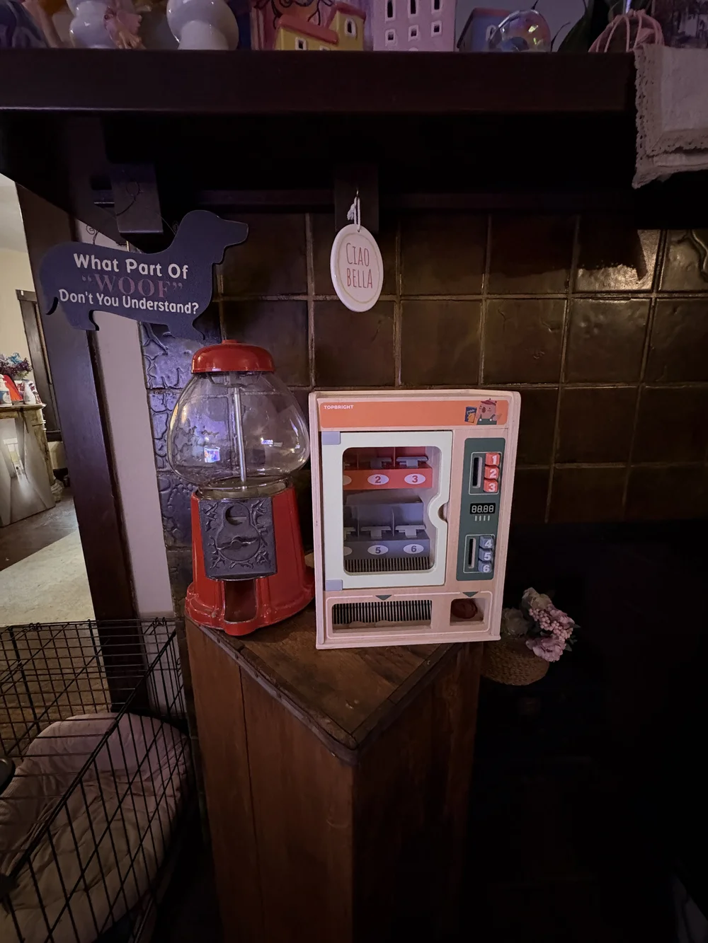 Vintage gumball machine and wooden toy vending machine