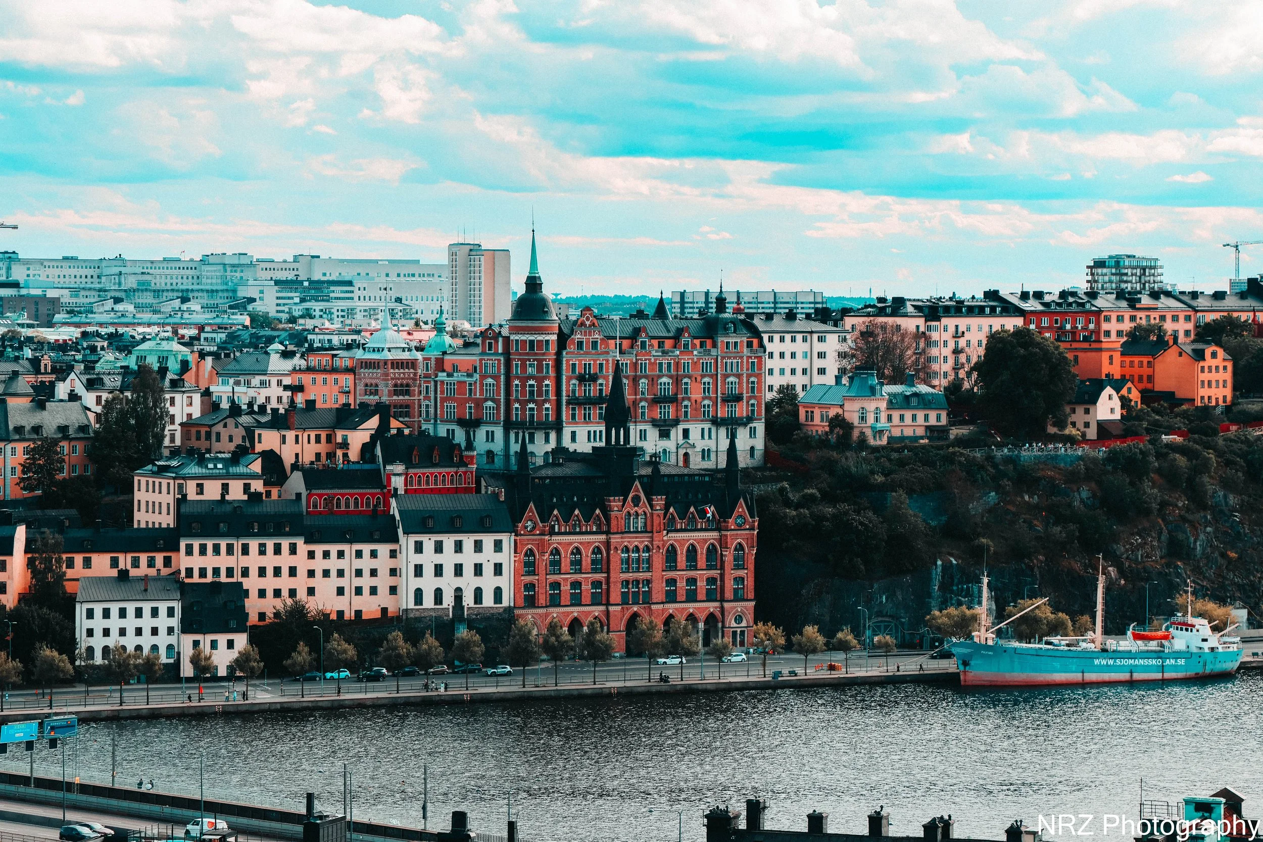 The Tale as Told by Storkyrkan

From my tower in Gamla Stan, I watch Stockholm breathe. The water below carries reflections of centuries, and across it rise the red brick houses of Södermalm like old companions. I, Storkyrkan, have stood here since t