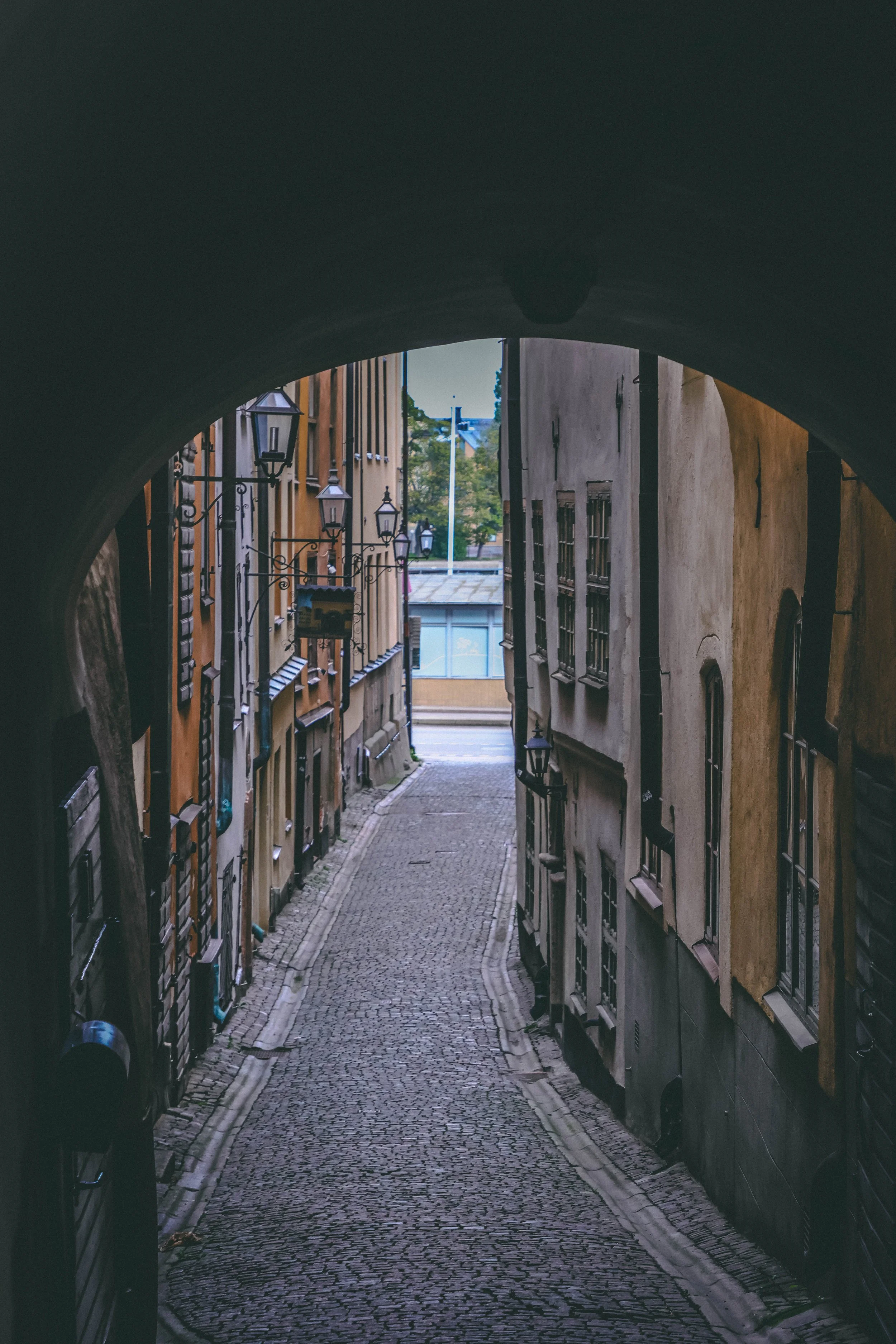 "There you are, dear traveller. Been looking for you. Come, tiptoe with me down this narrow, sleepy street where the lanterns flicker like secrets and the cobblestones remember every footstep. The air hums with forgotten lullabies, and if you listen
