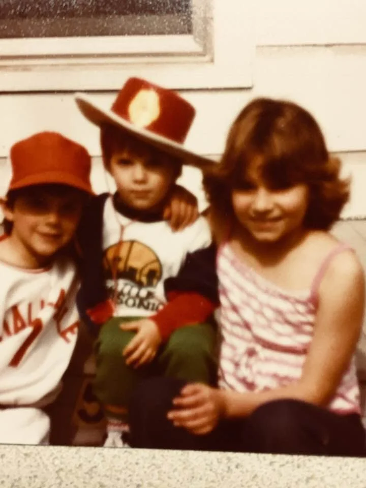 With her siblings in Fairfield, Iowa, circa 1977