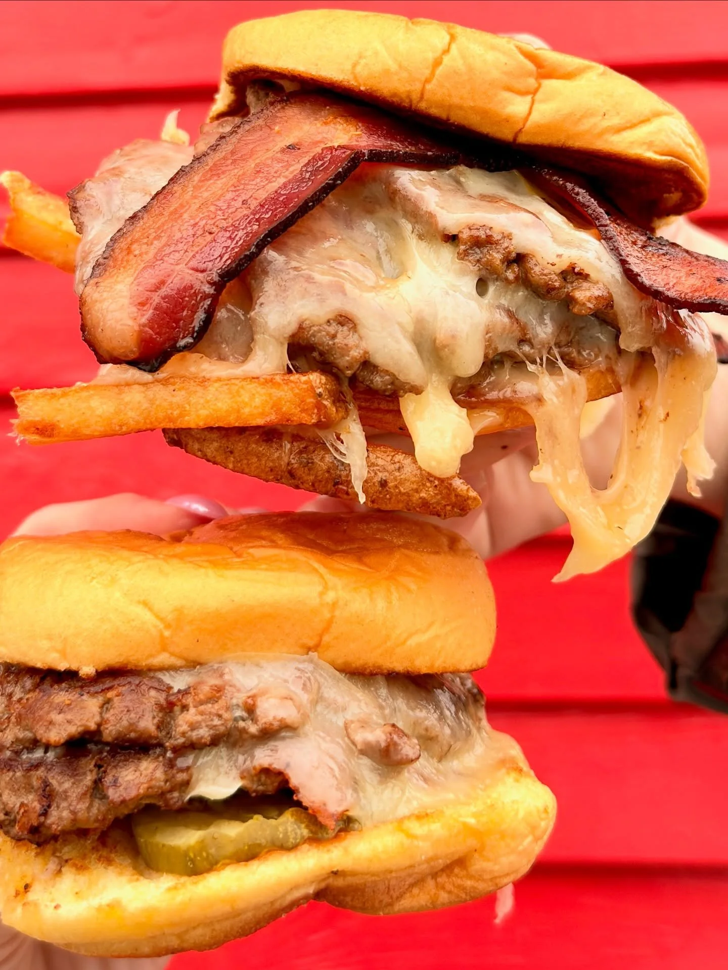 Help us pick a caption:
1. Messy and proud 
2. Not sure what that fry is doing but it made for a good bite 
3. Cheesy goodness 
4. Create your own and drop it in the comments