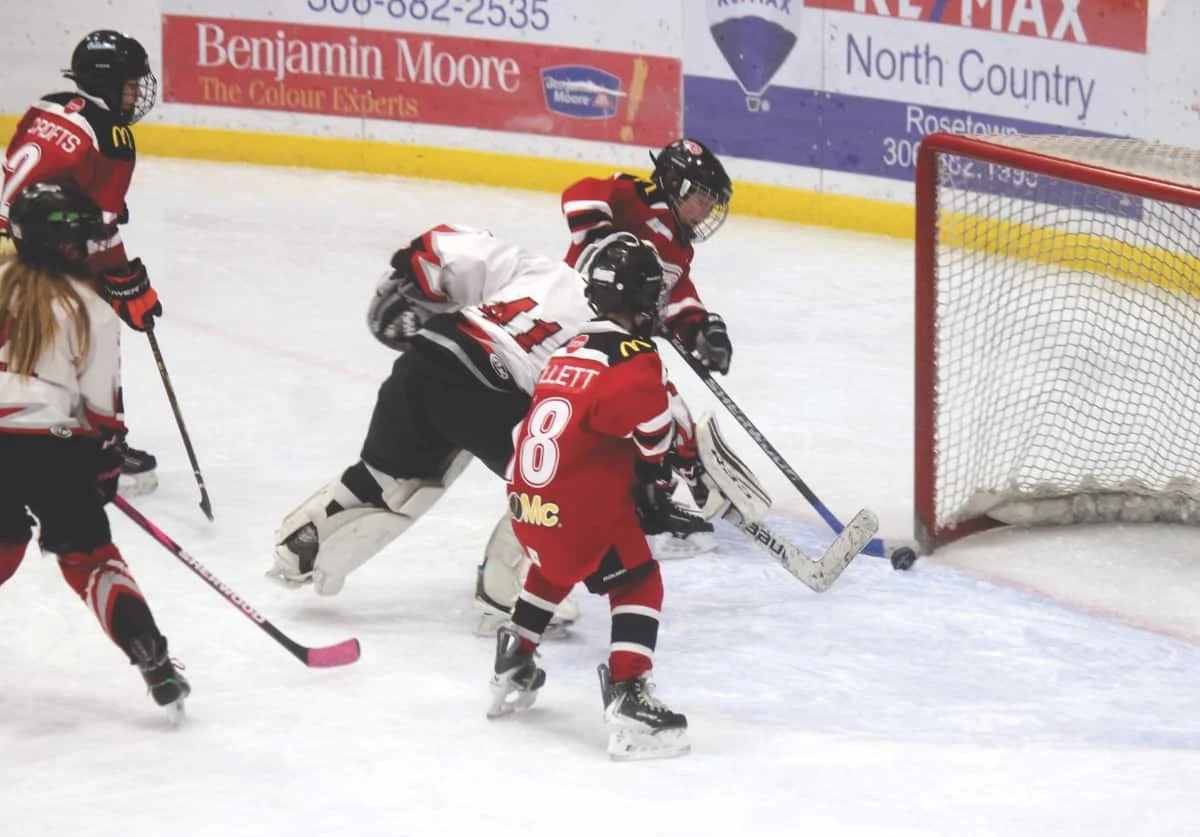 Getting sticks on a rolling puck